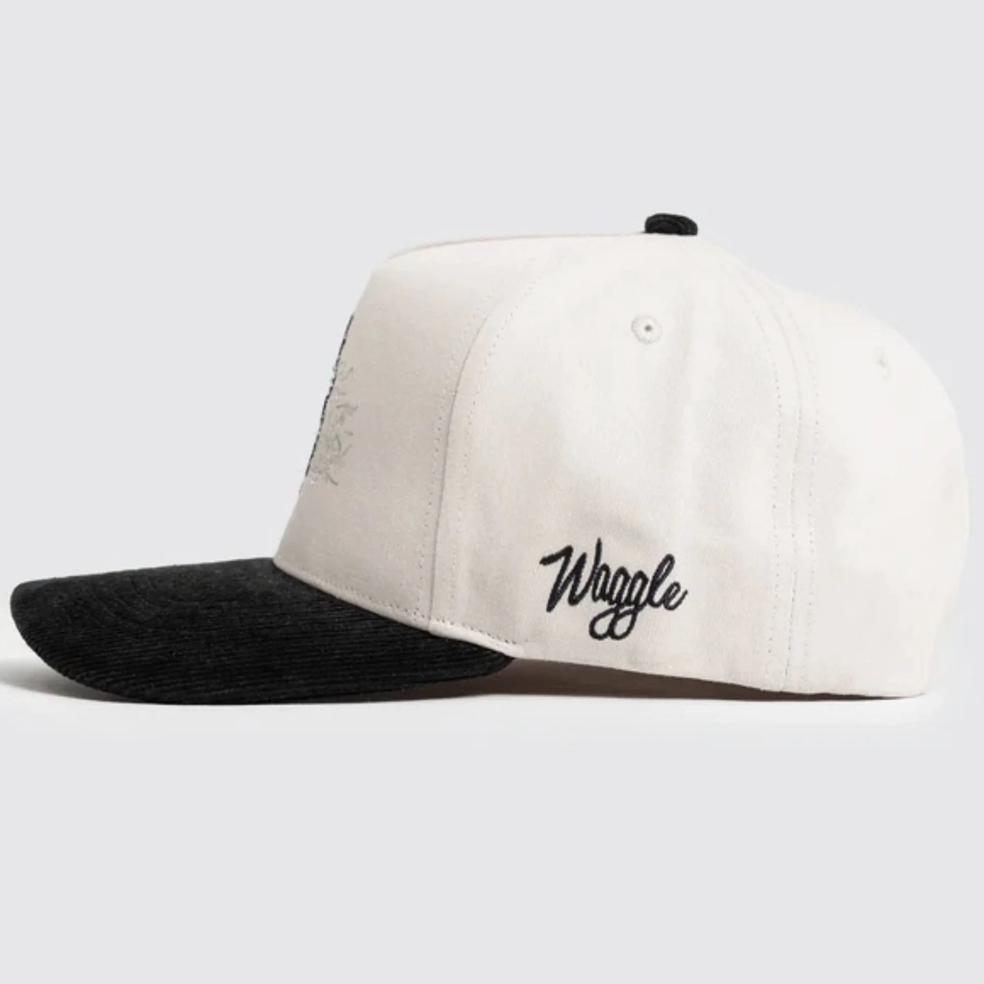 Waggle Trash Bandit Corduroy Brim hat, side view with Waggle script logo