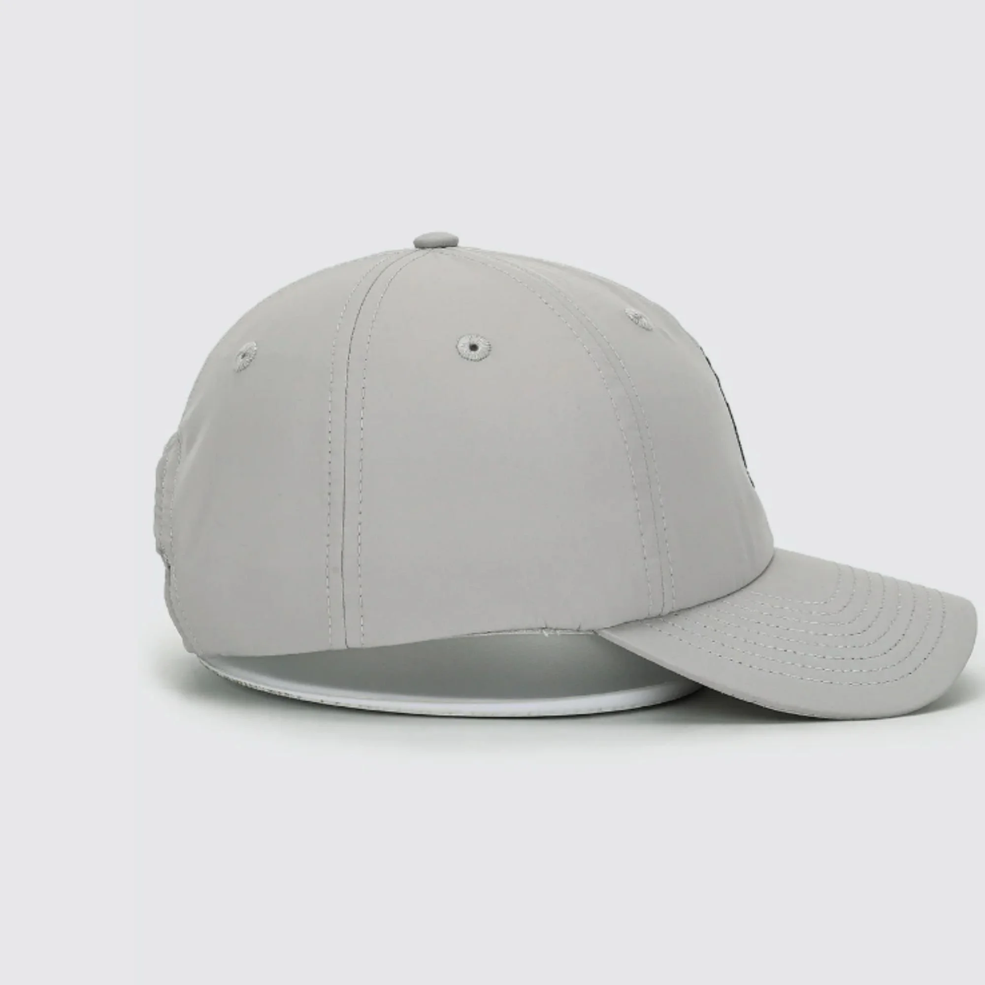 Waggle Chill Out Flight hat, left side view showing curved bill and low-profile fit