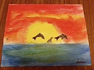 Dlophins diving by Lily aged 11.jpg