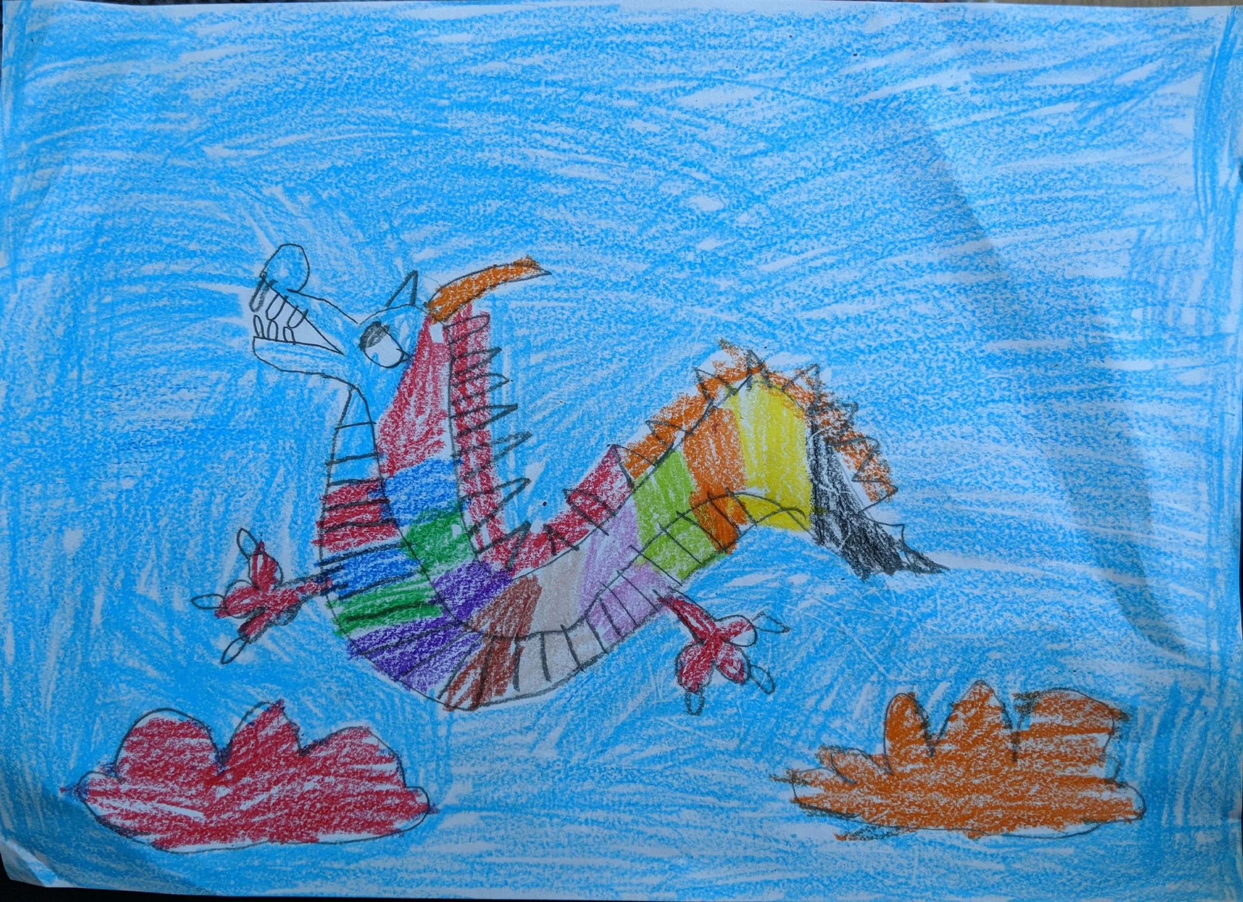 Rainbow dragon by Shivan aged 7.jpg
