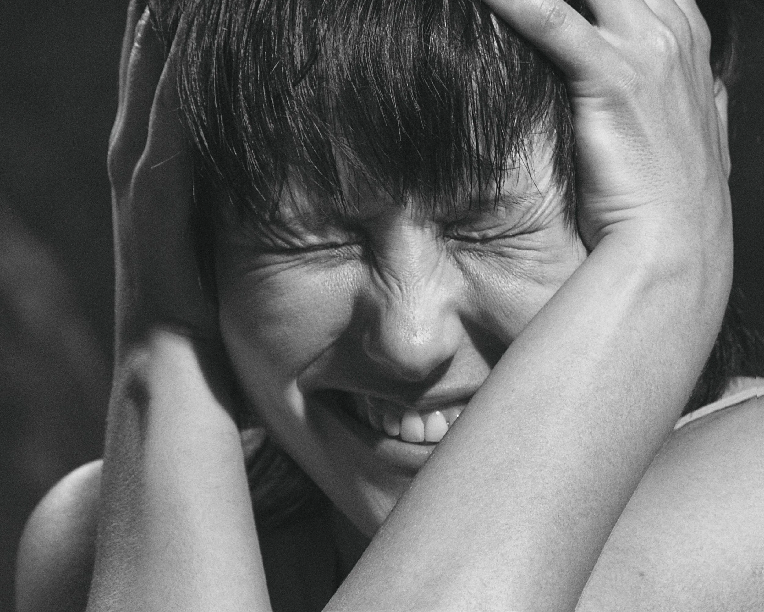 Woman experiencing emotional overwhelm and stress.