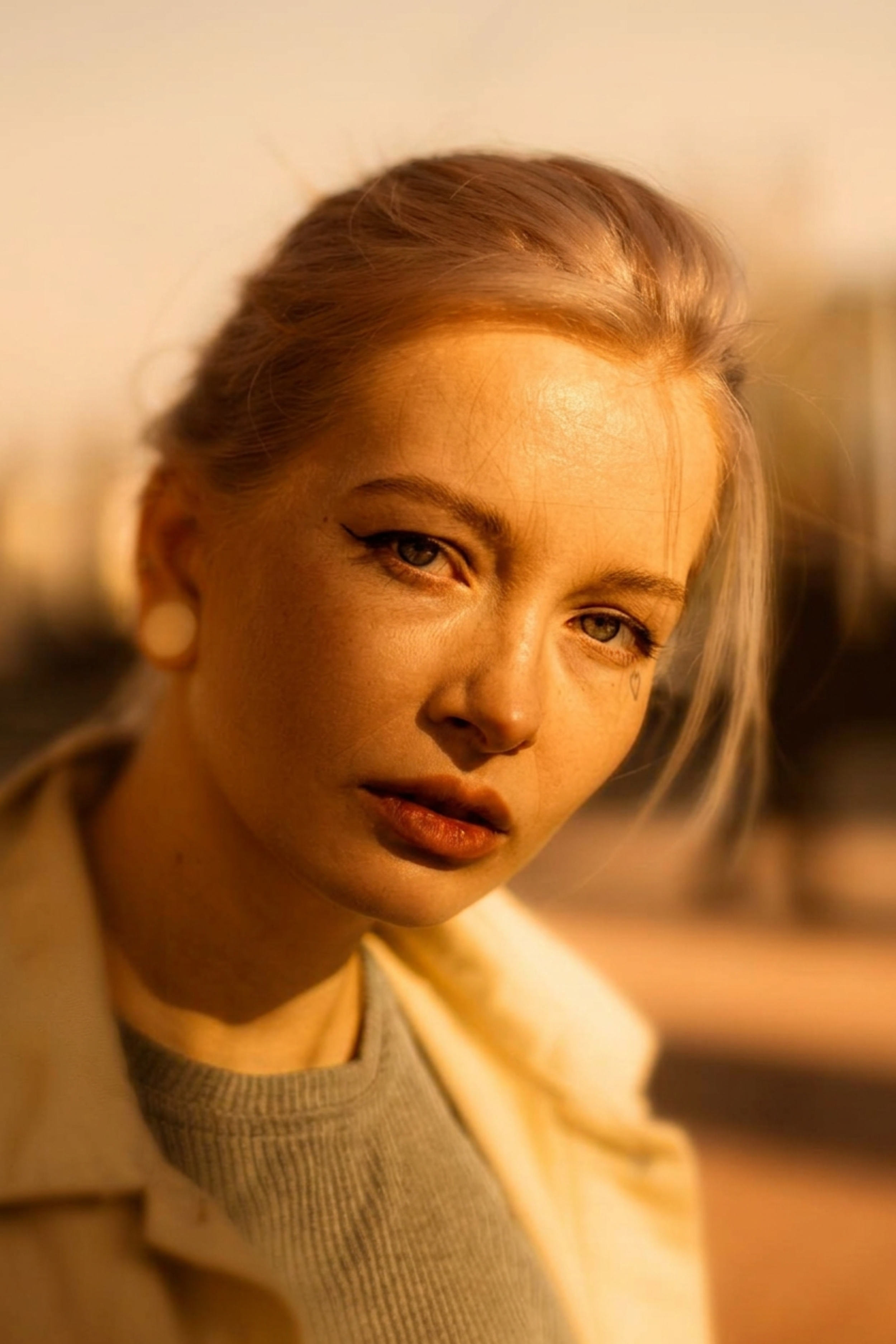 Reflective woman appearing thoughtful and emotionally contemplative.