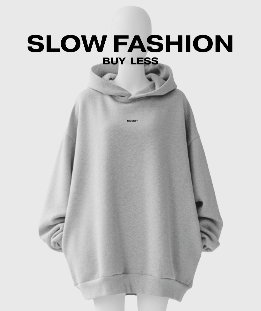 Gray hoodie displayed on a mannequin with text 'Slow Fashion Buy Less' over it.