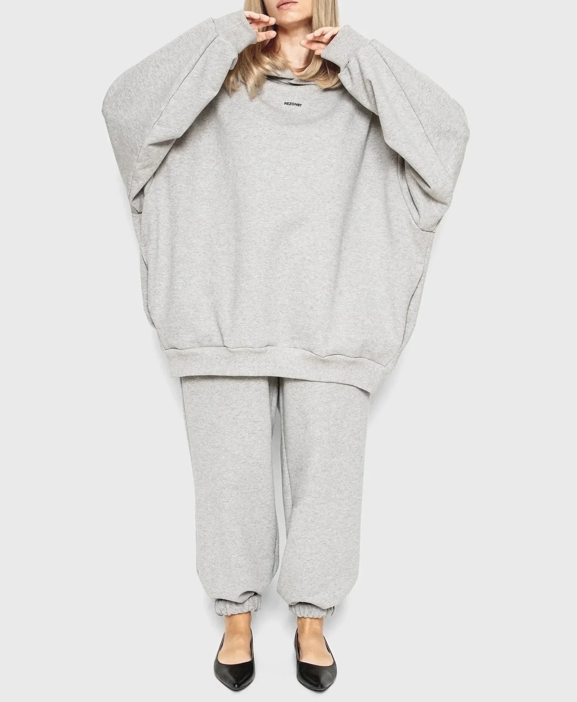 Elegant oversized grey melange hoodie  and sweatpants made from 100% premium cotton, part of the ESSENCE collection by REZON8T.Limited edition.