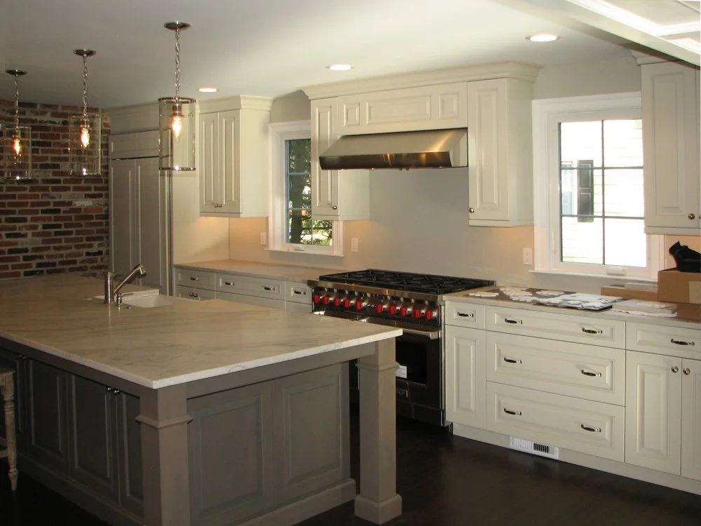 Finished kitchen with granite counter tops and island sink