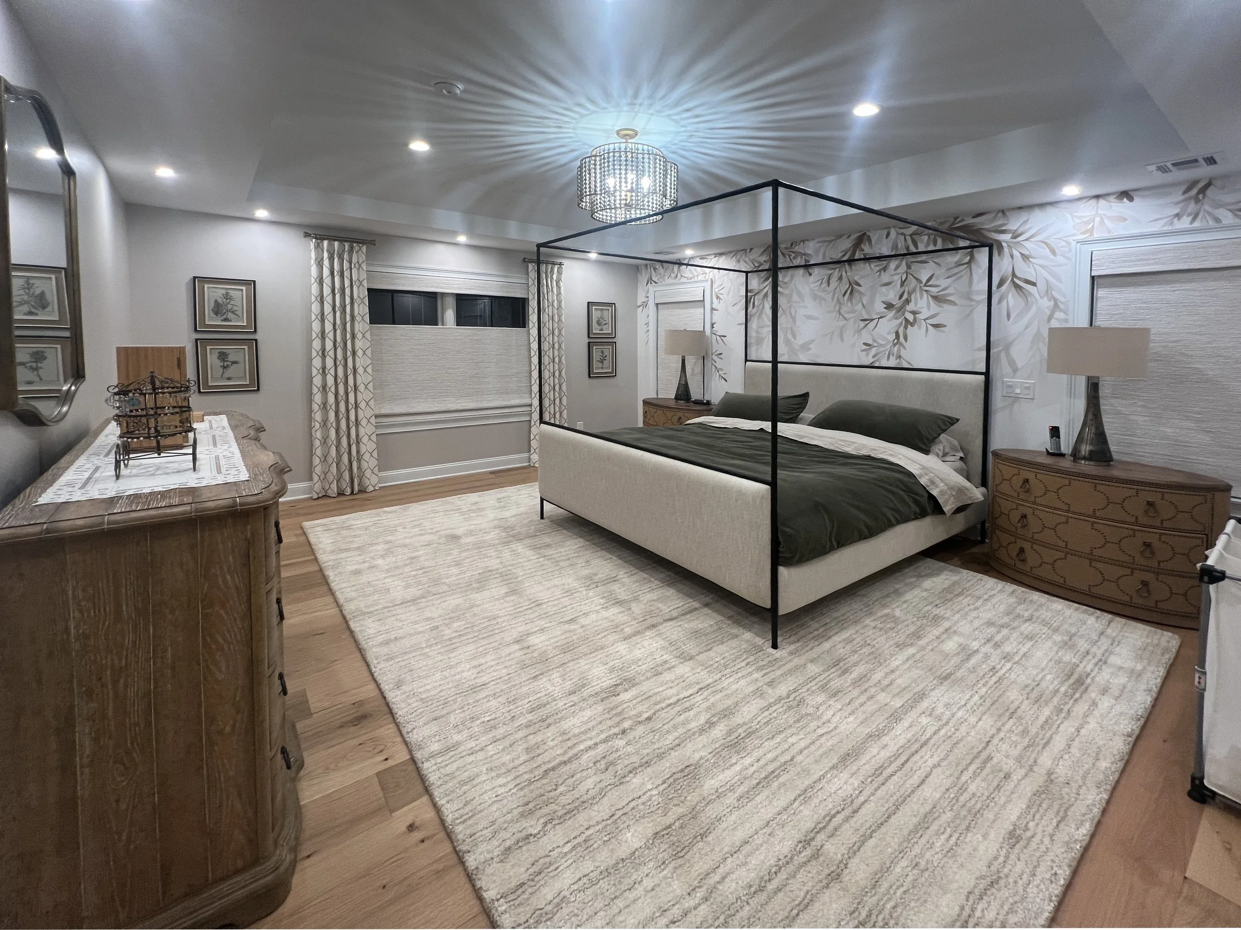 Primary bedroom with four-poster bed