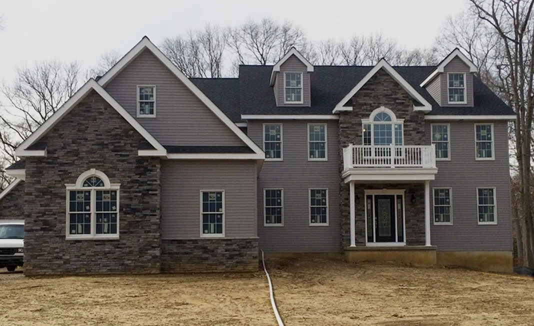 Front of two-story home during construction