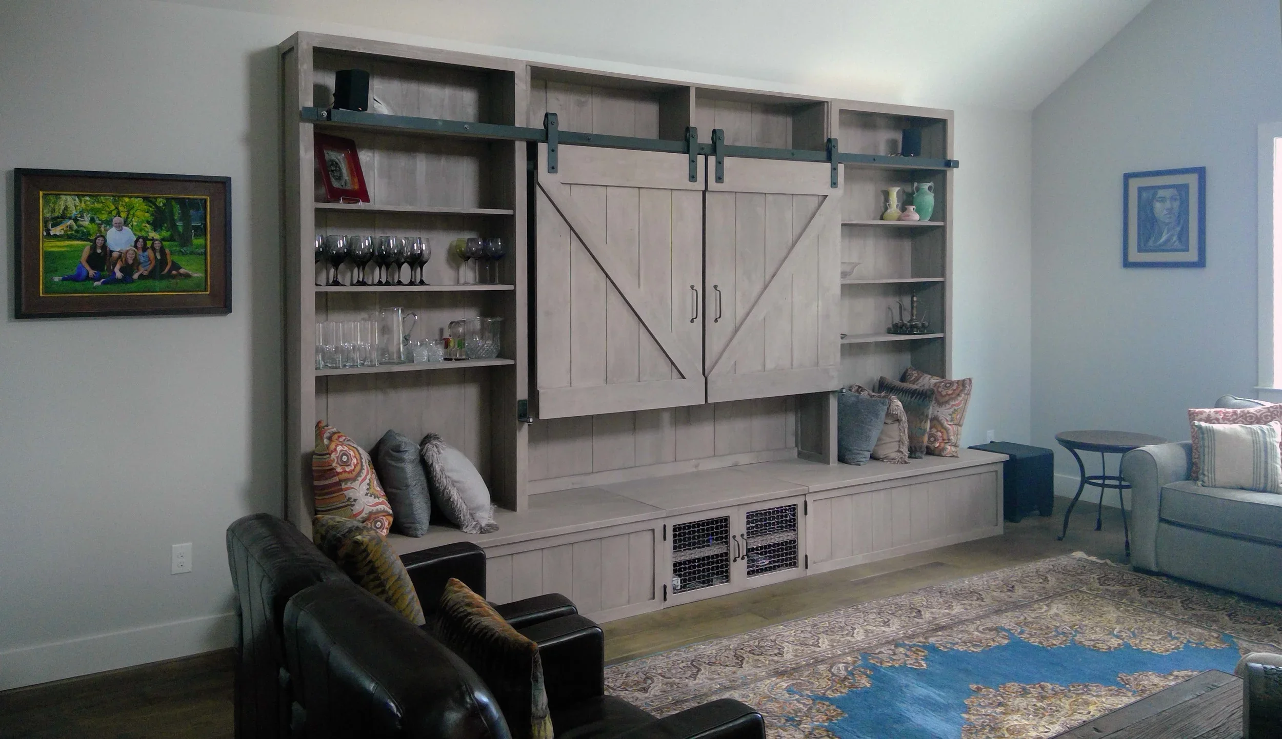 Build-in shelving with barn doors