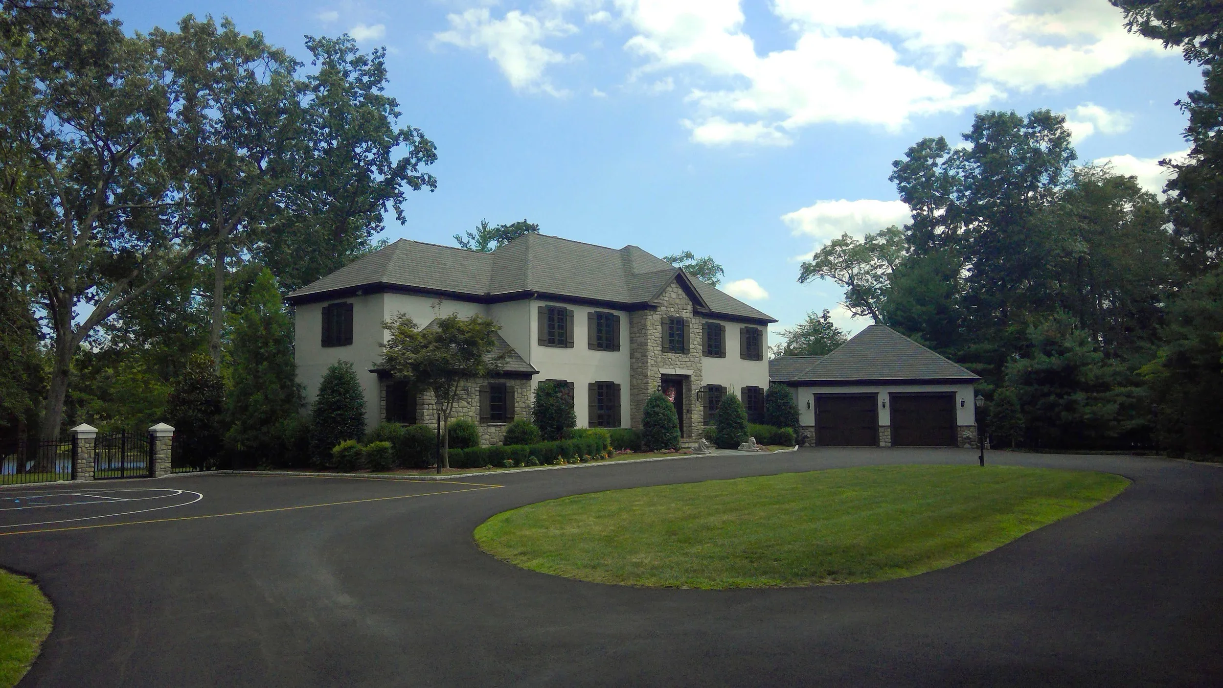 Two-story stucco home with two-car garage