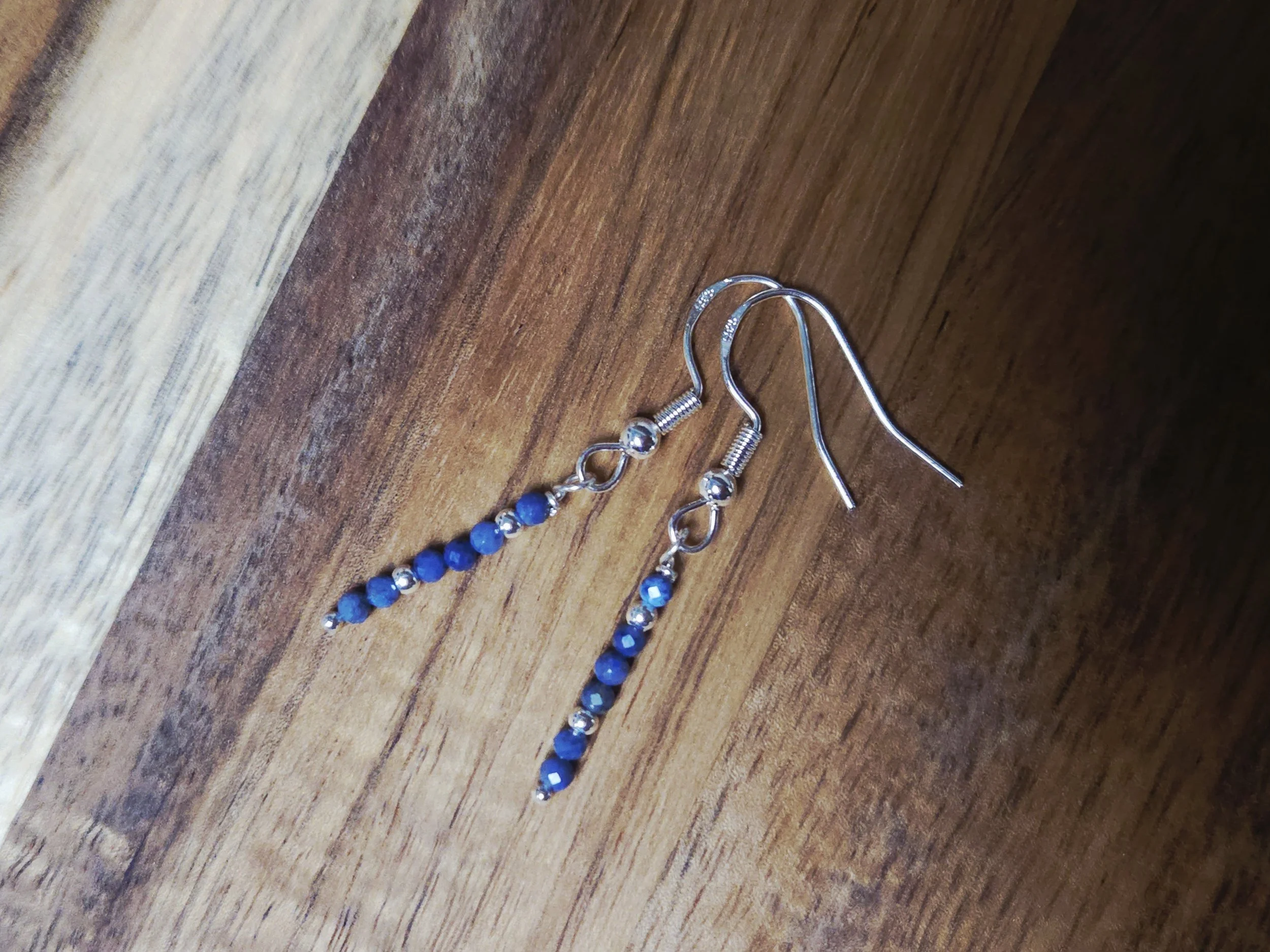 sterling silver earrings with blue sapphire