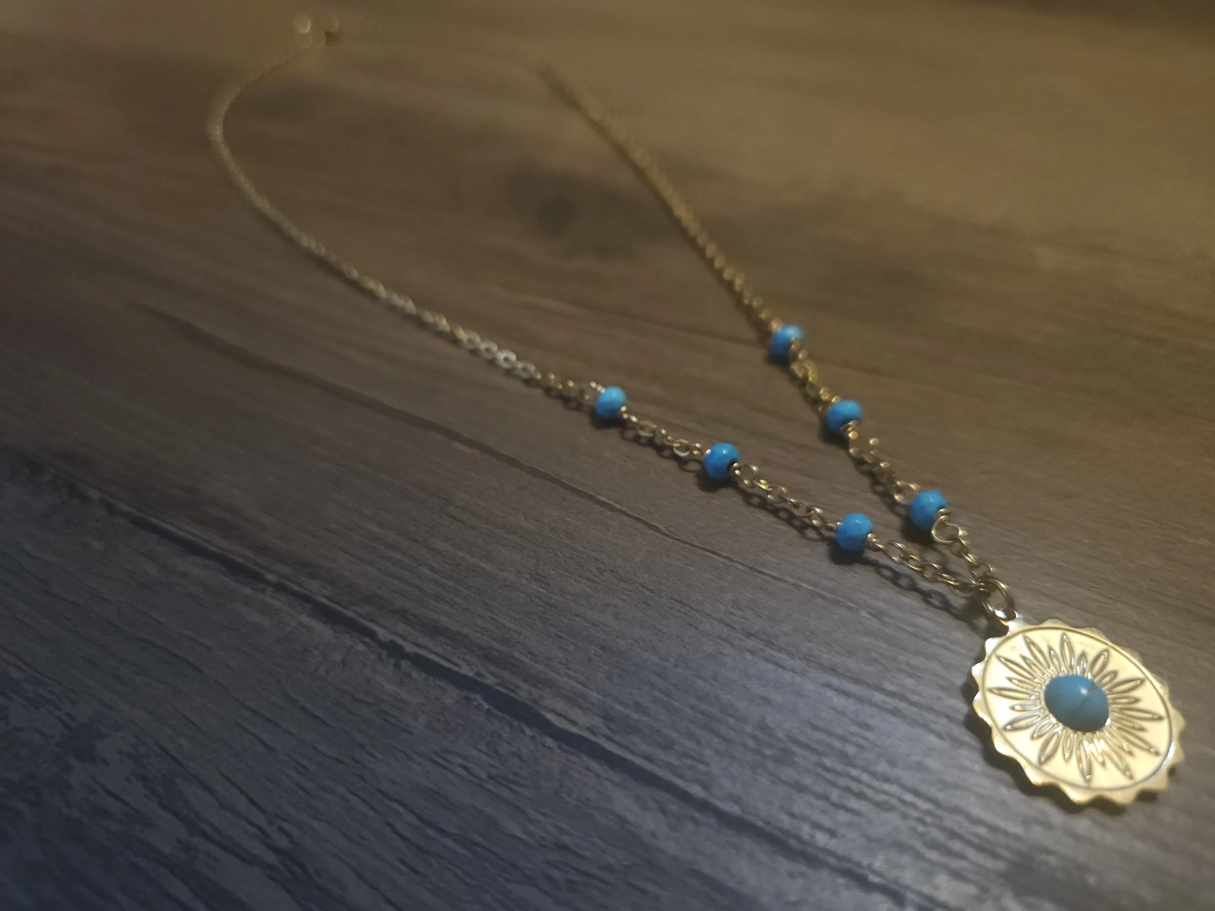 Long gold necklace for cowgirls boho style with gold and blue accents