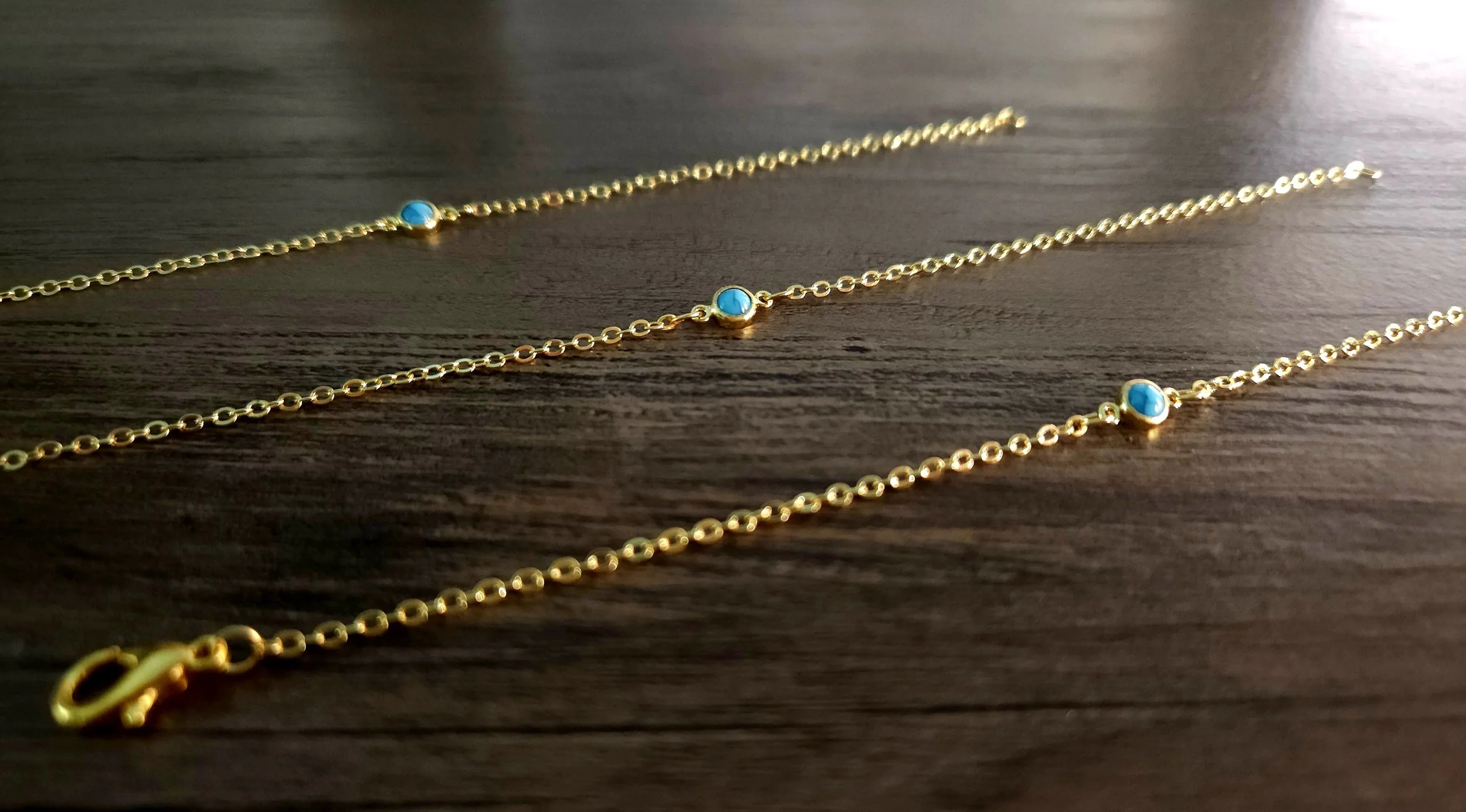 turquoise and gold bracelet layered for a western cowgirl beach vibe