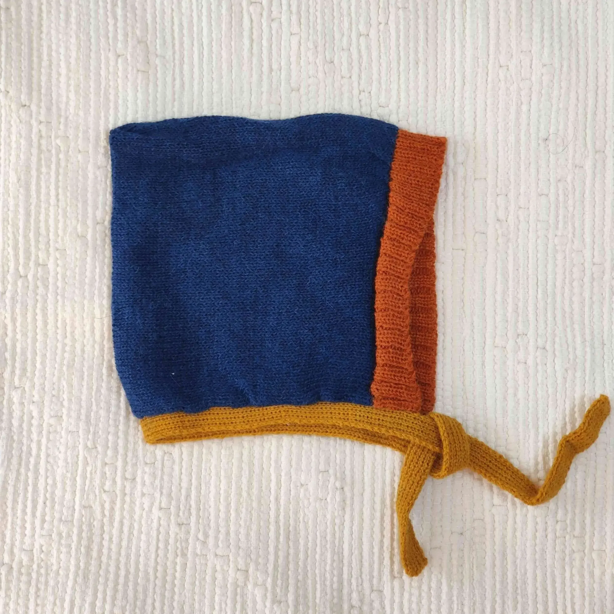 Bonnet béguin en alpaga pour bébé avec motif uni