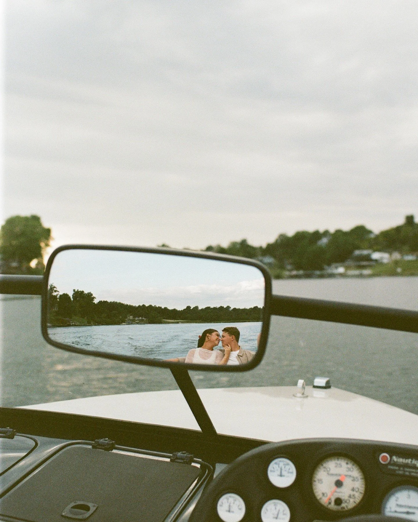 On the water where it all began. Libby &amp; Alex&rsquo;s engagement session couldn&rsquo;t have been more meaningful &mdash; his family&rsquo;s boat at their lake house, the same place where Alex proposed, and where his parents first met years ago. 