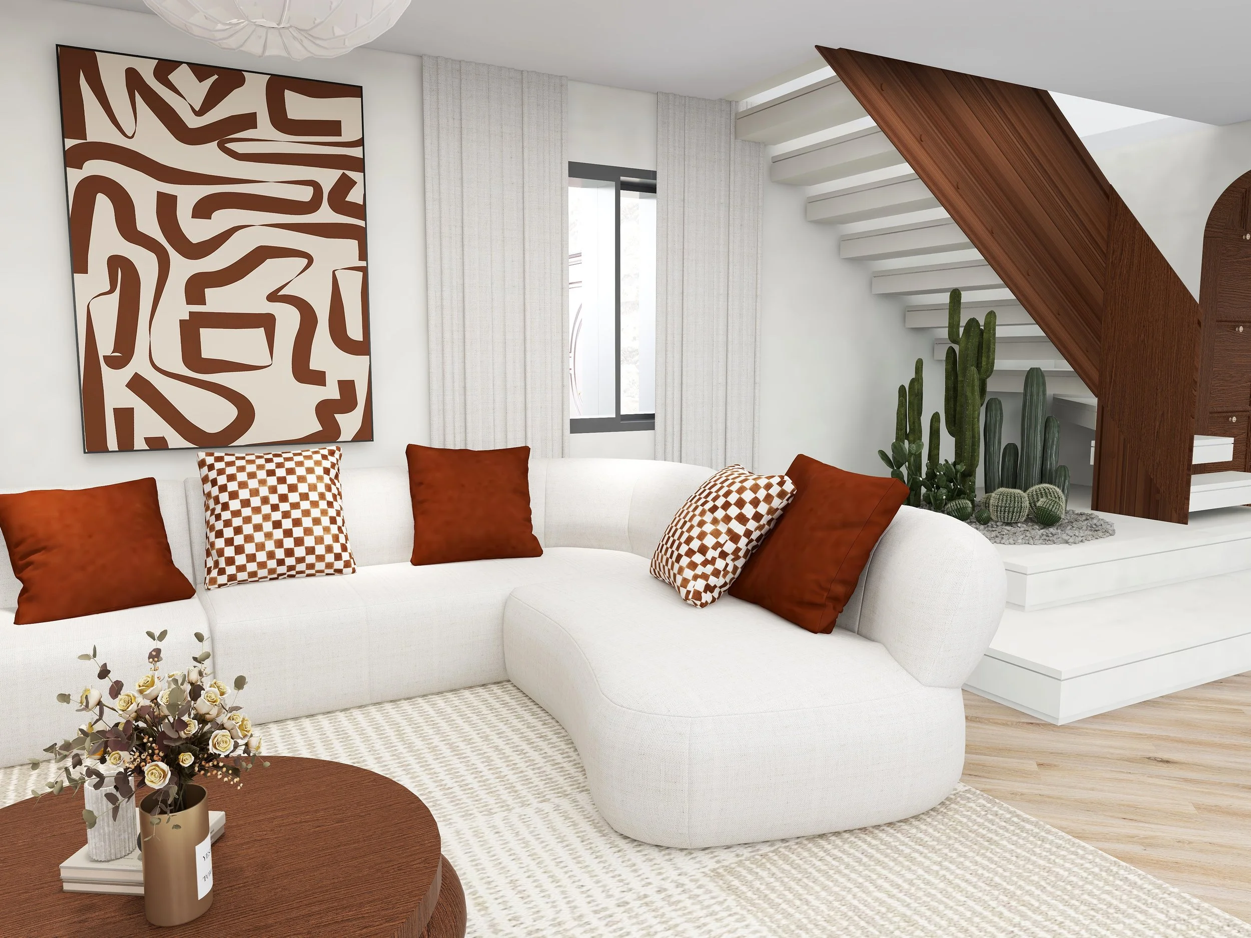 Salon moderne avec un canapé blanc, des coussins marron et à motif, un tableau abstrait sur le mur, une plante de cactus, et une table basse en bois avec un vase de fleurs.