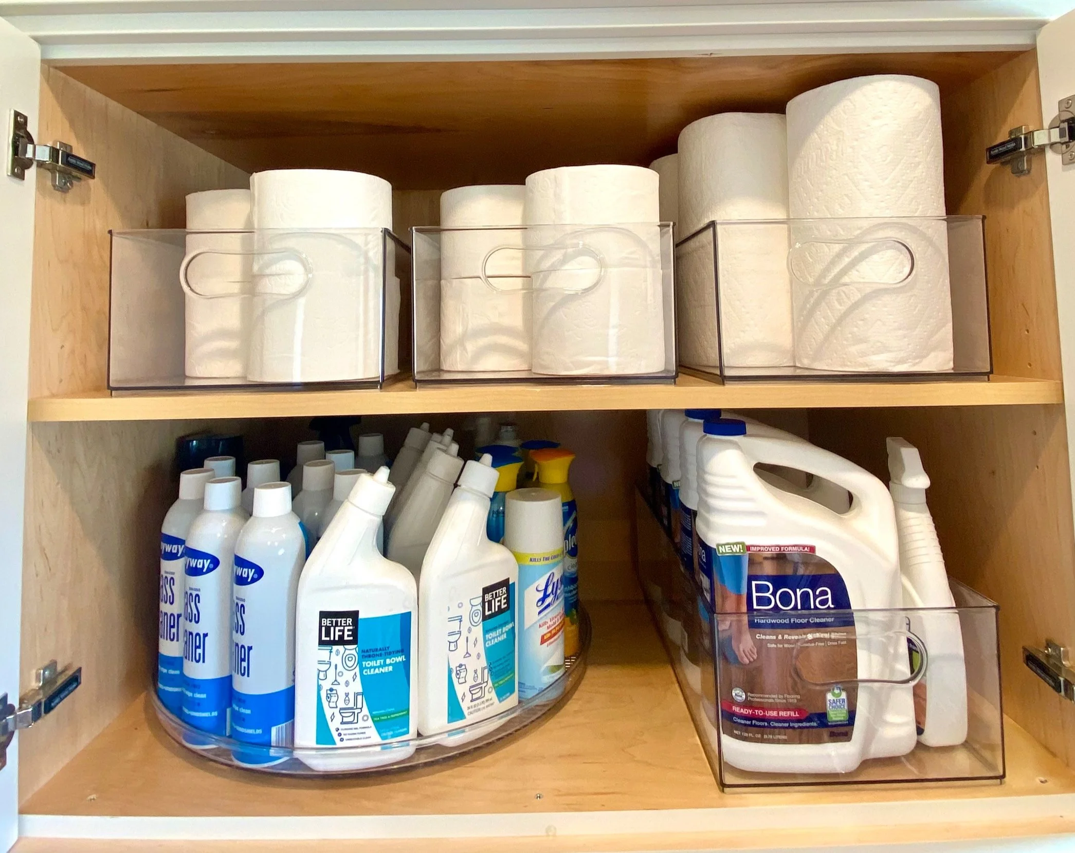Laundry and cleaning supply cabinet organized by professional organizer in Austin TX