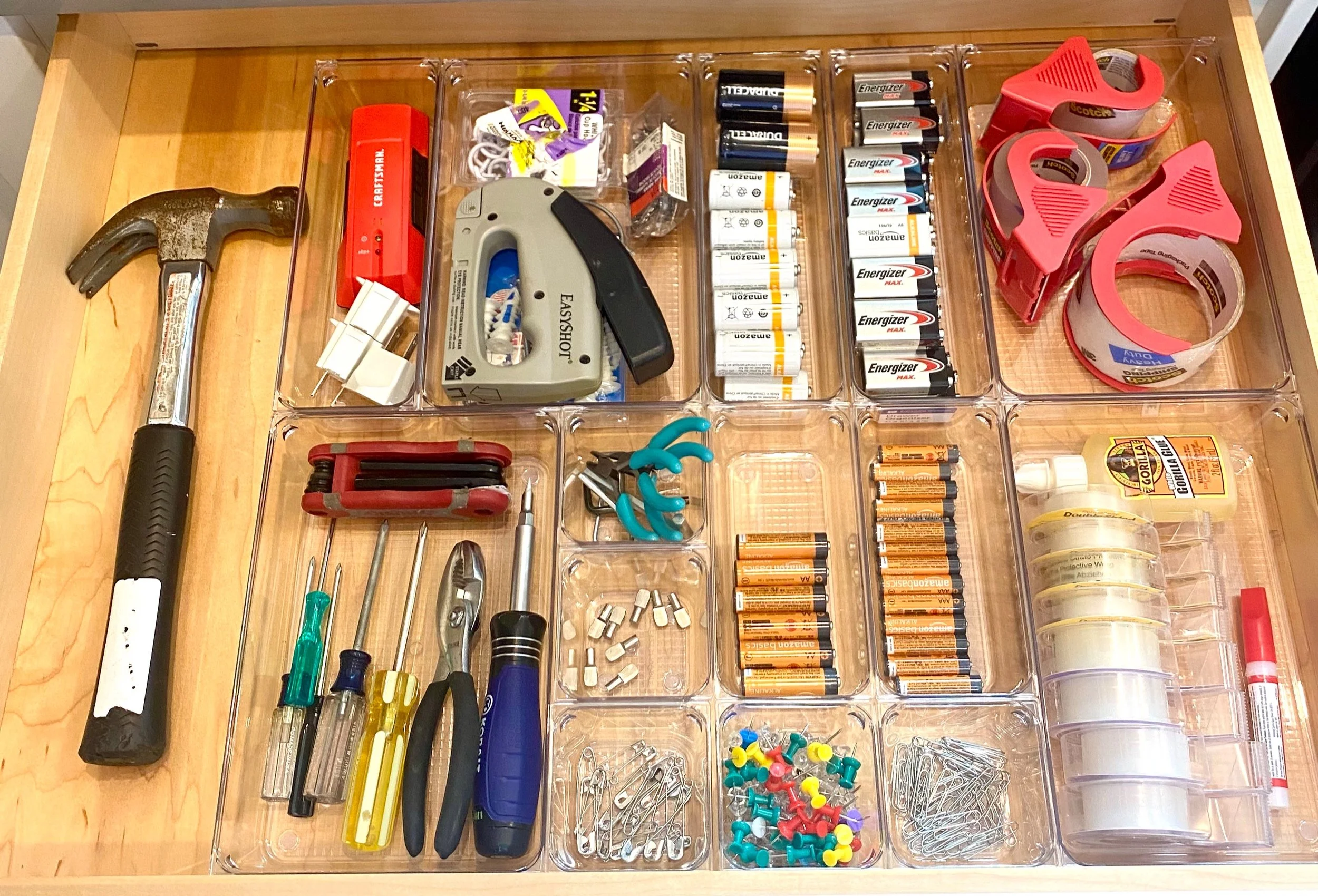 Utility drawer organization with tools and batteries by Austin TX professional organizer