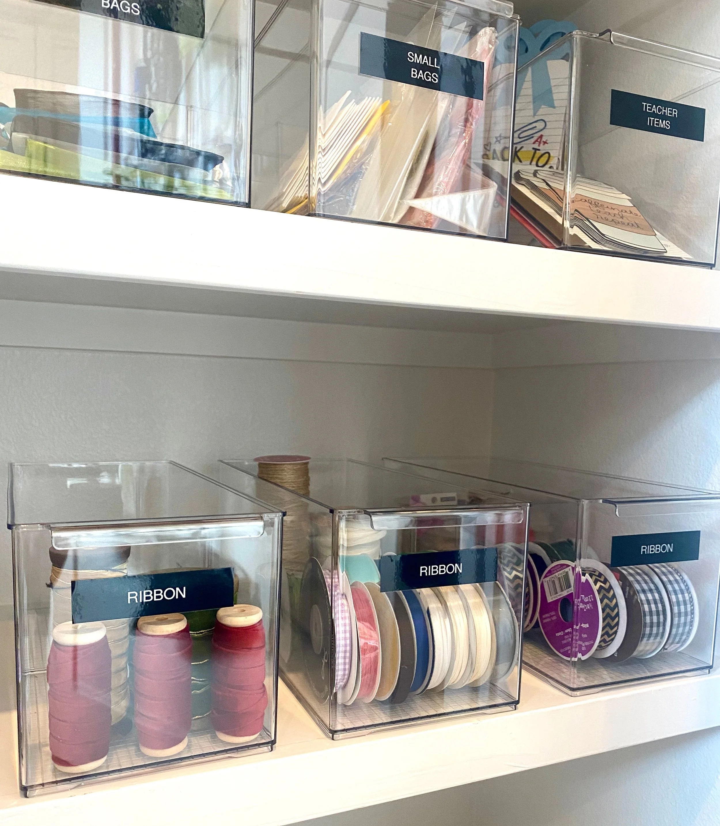 Craft and household supply organization with clear bins by Austin home organizer