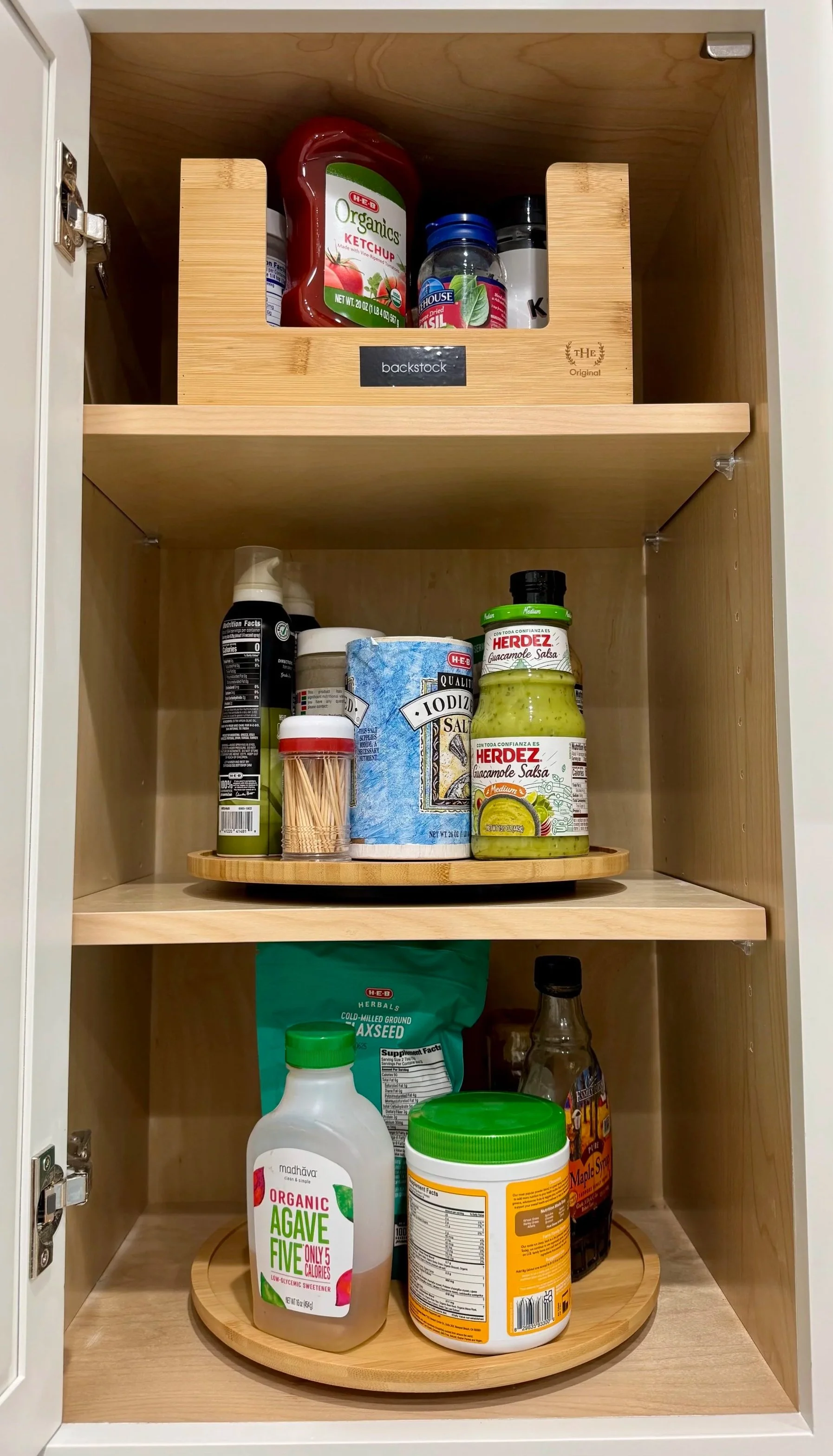 Organized pantry cabinet in Austin TX by professional home organizer Live Organized by Erin