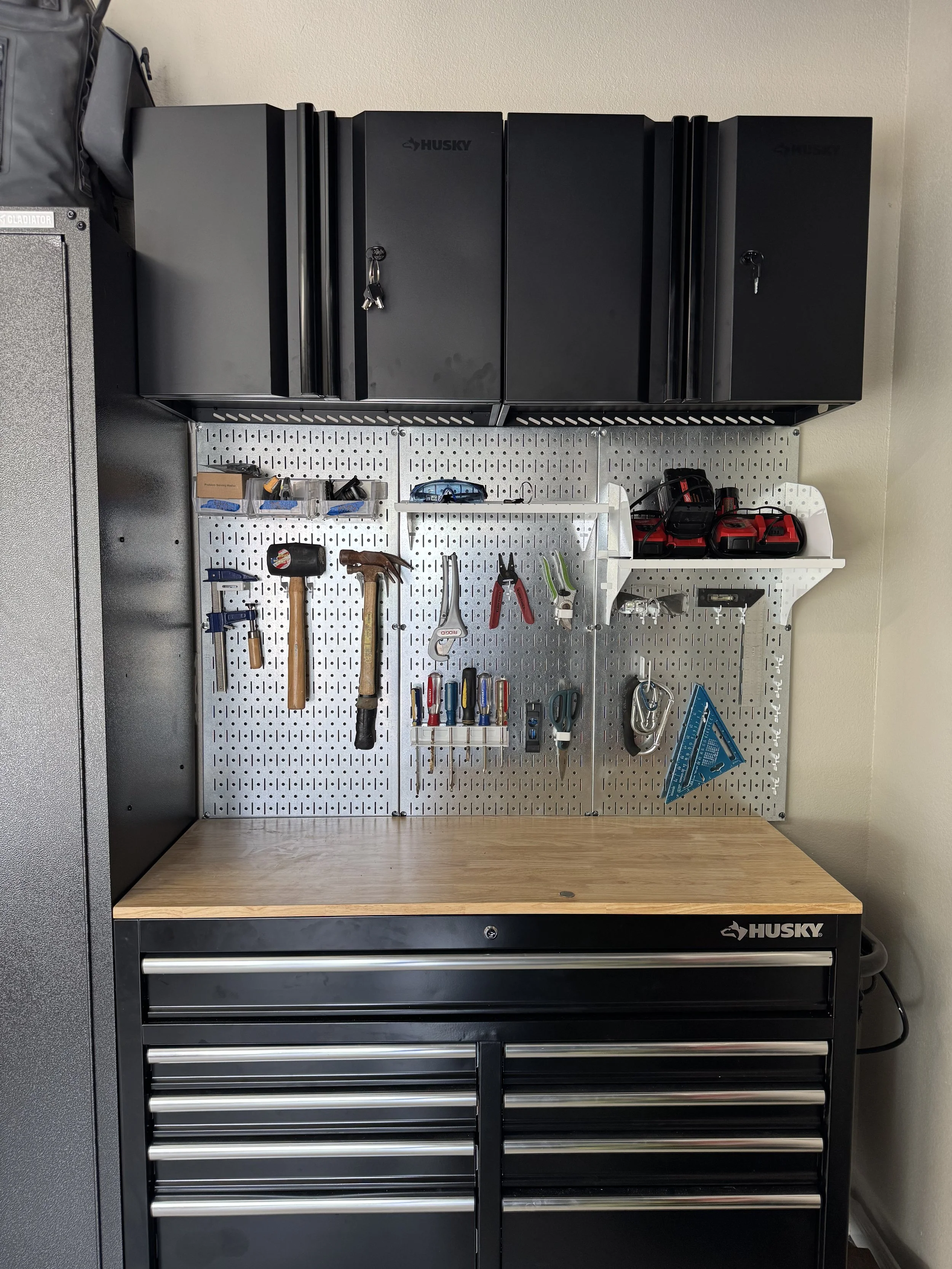 Custom garage workbench and pegboard organization by Austin Texas professional home organizer