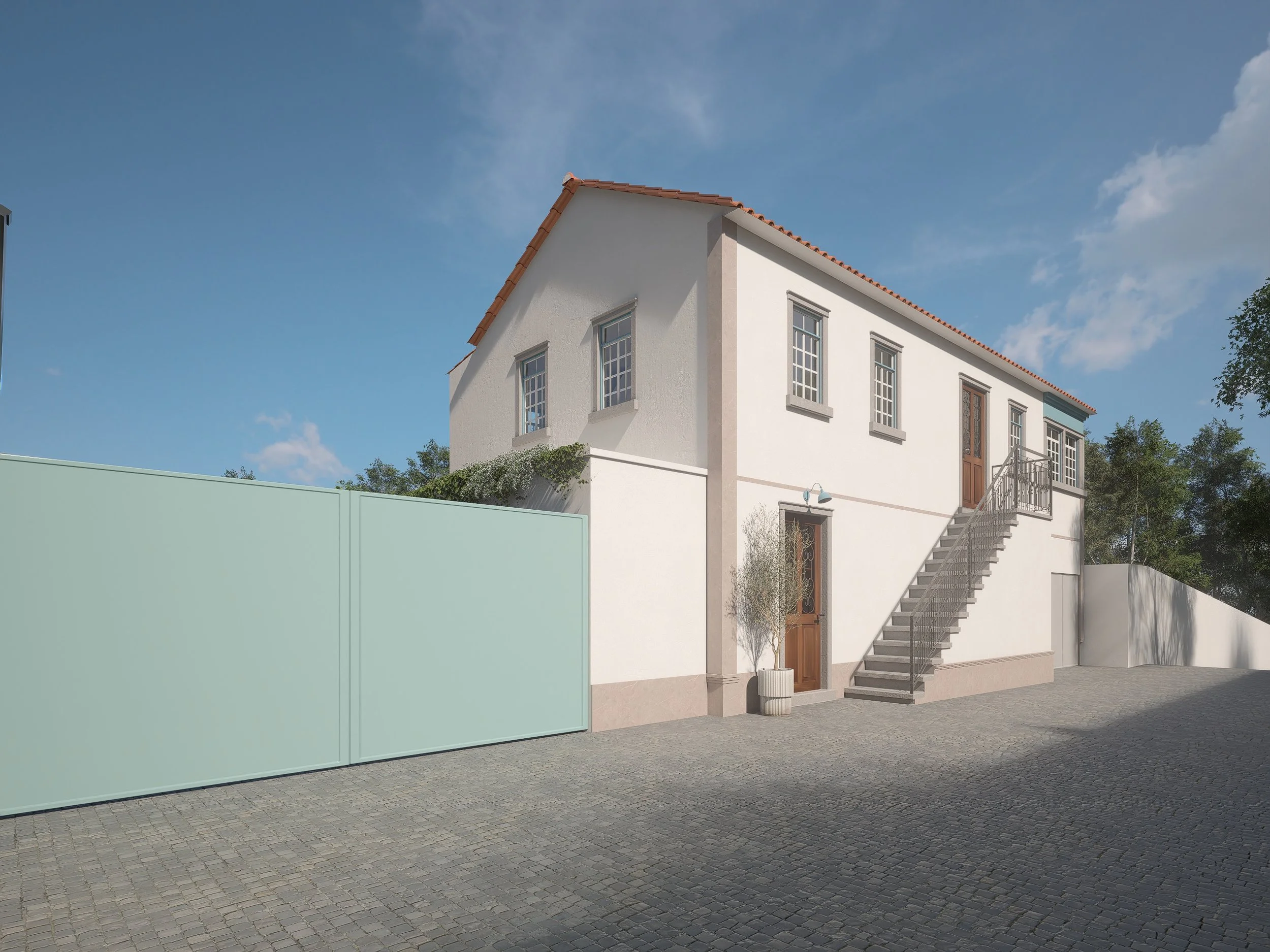 Remodelação de moradia centenária em Coimbra com recuperação da fachada original em tons tradicionais portugueses e integração de design contemporâneo.
