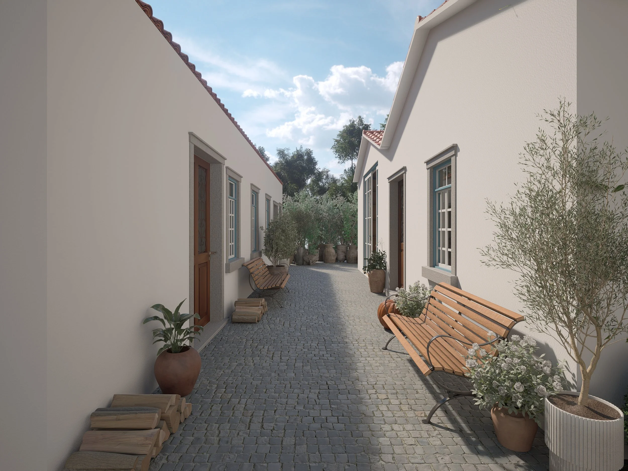 Espaço exterior de moradia portuguesa remodelada com área de convívio, zona de jogos e integração da paisagem natural.