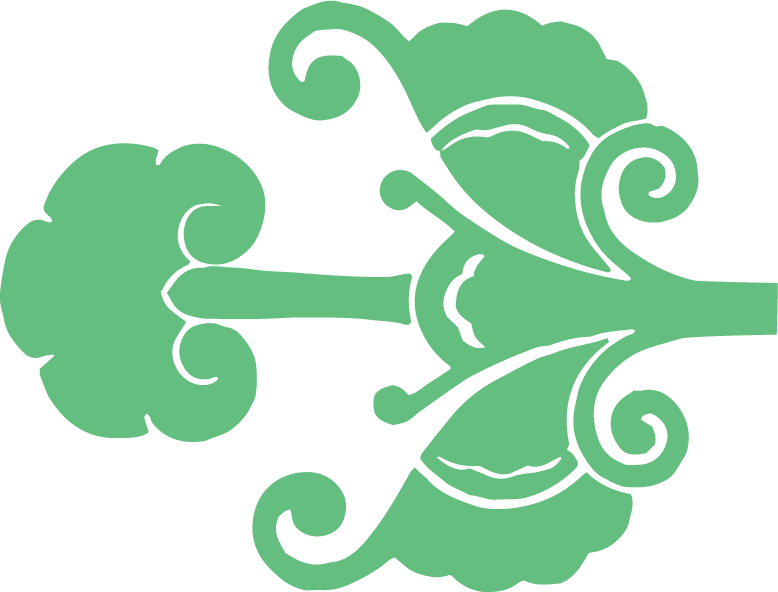 Decorative green symmetrical floral pattern with swirling designs and leaf motifs.