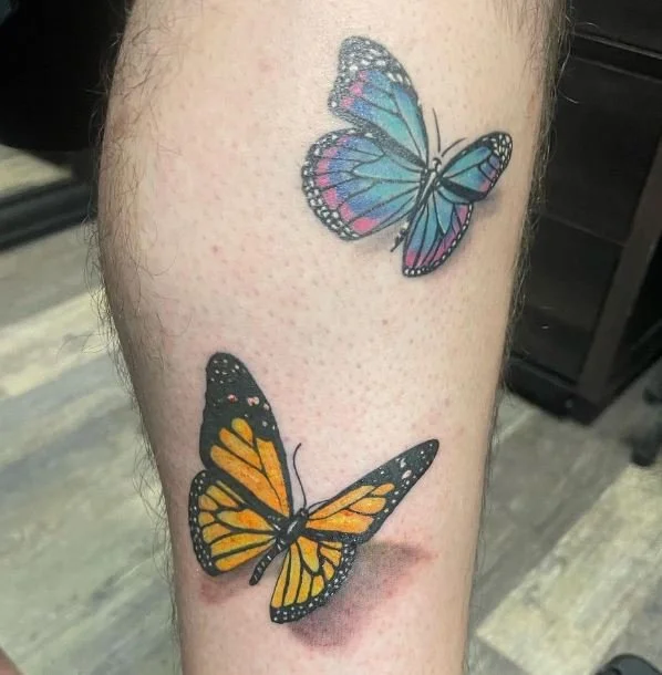 colored butterfly tattoo designs