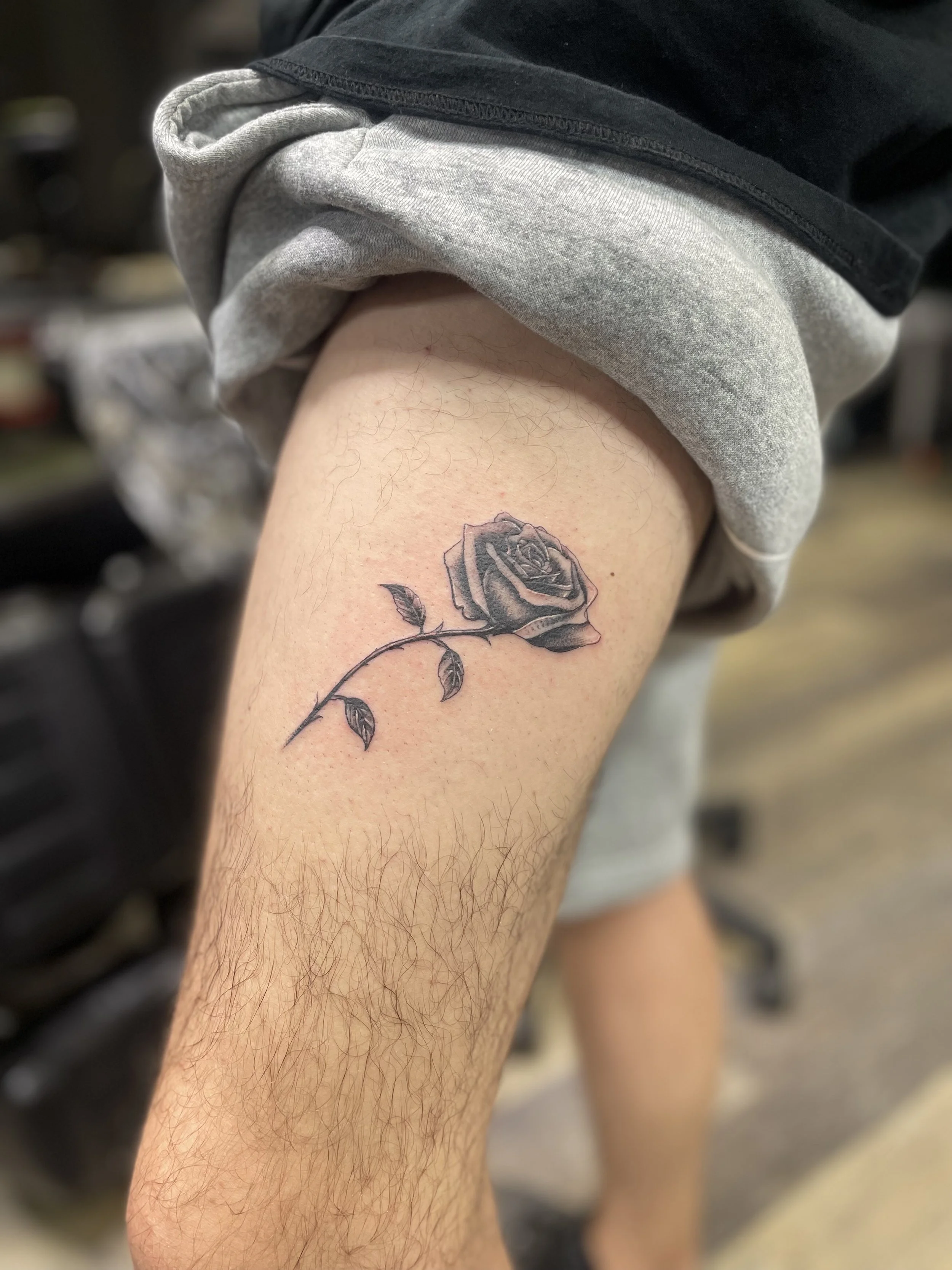 fine line flower tattoo.JPEG