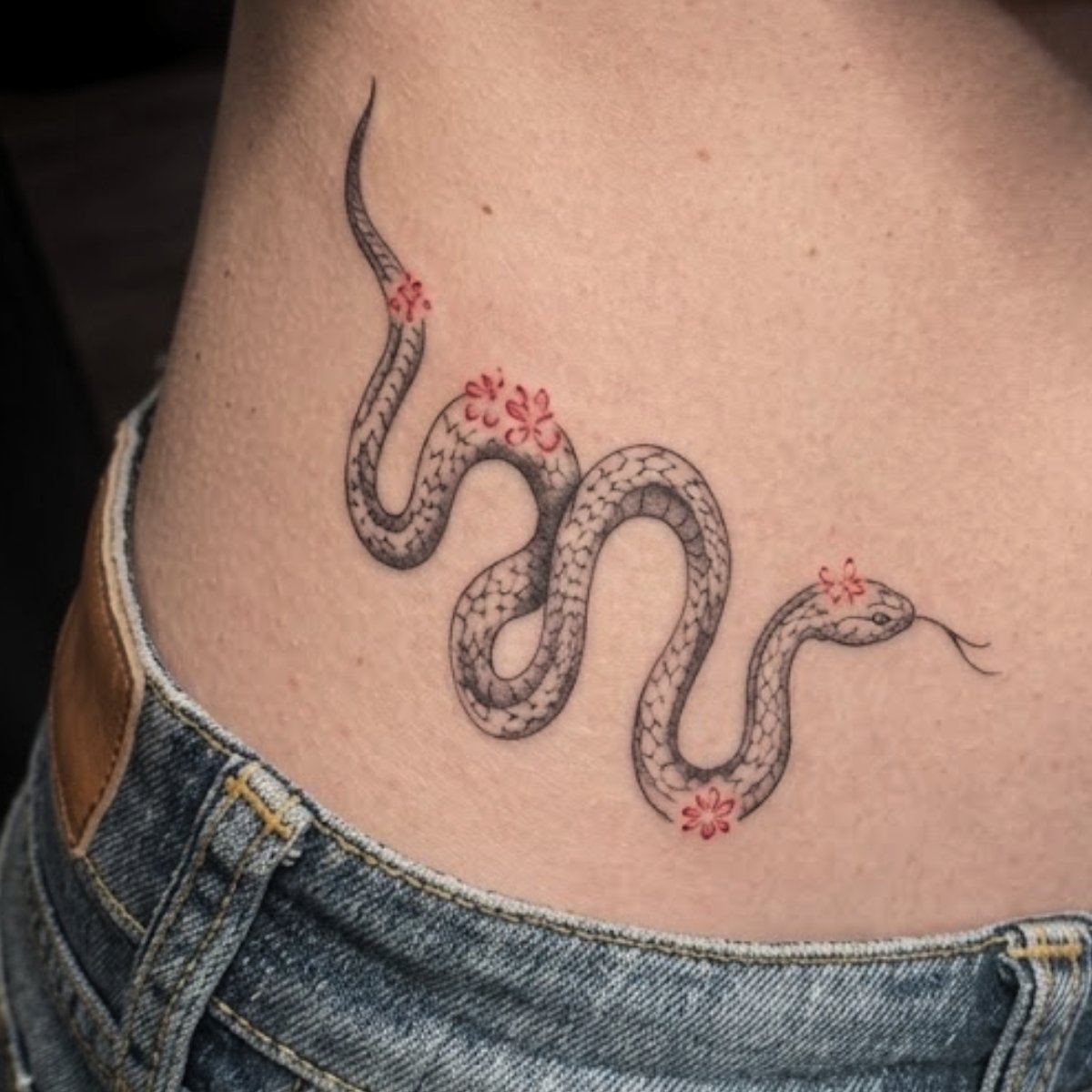Snake Tattoo Meaning: Ultimate Guide to Symbolism, Cultural History, and Design Styles