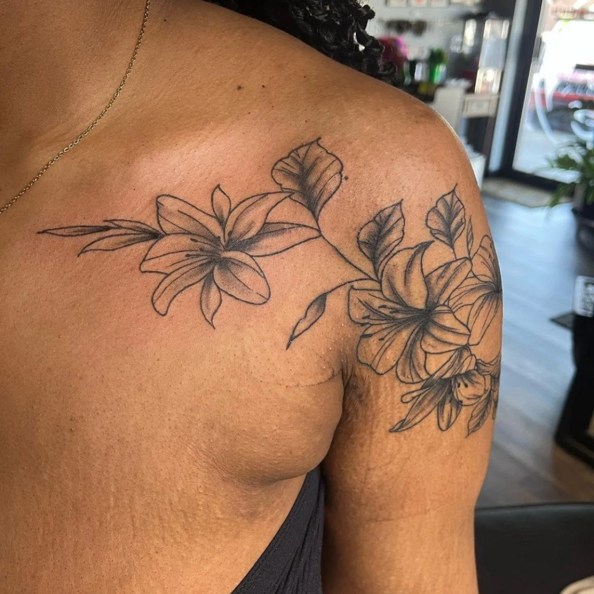 arm flowe tattoo.jpg