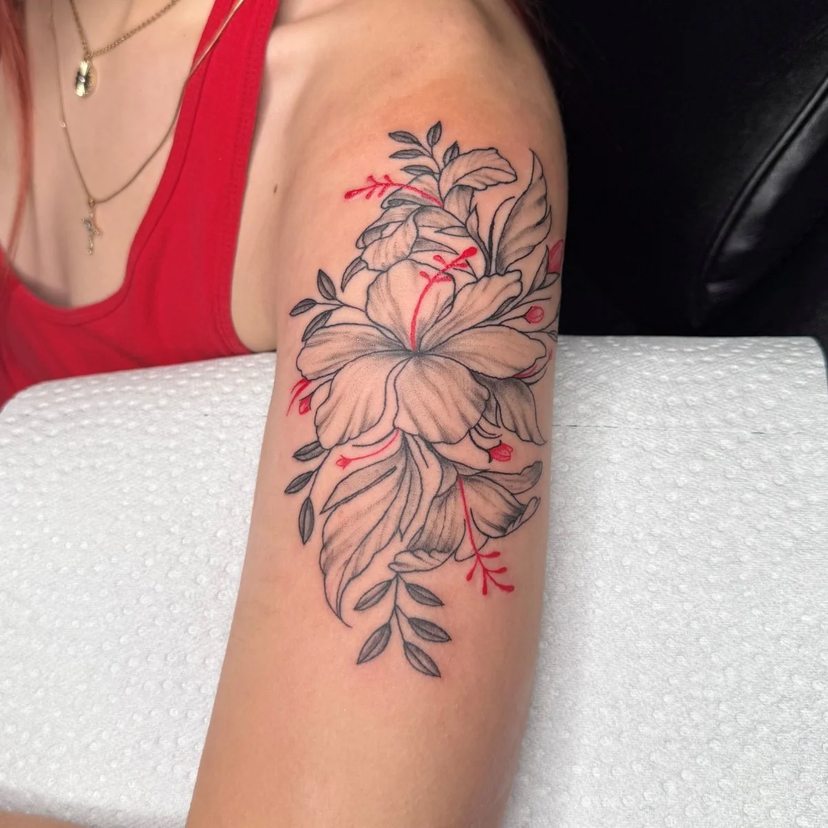 Flower tattoo in arms.jpg
