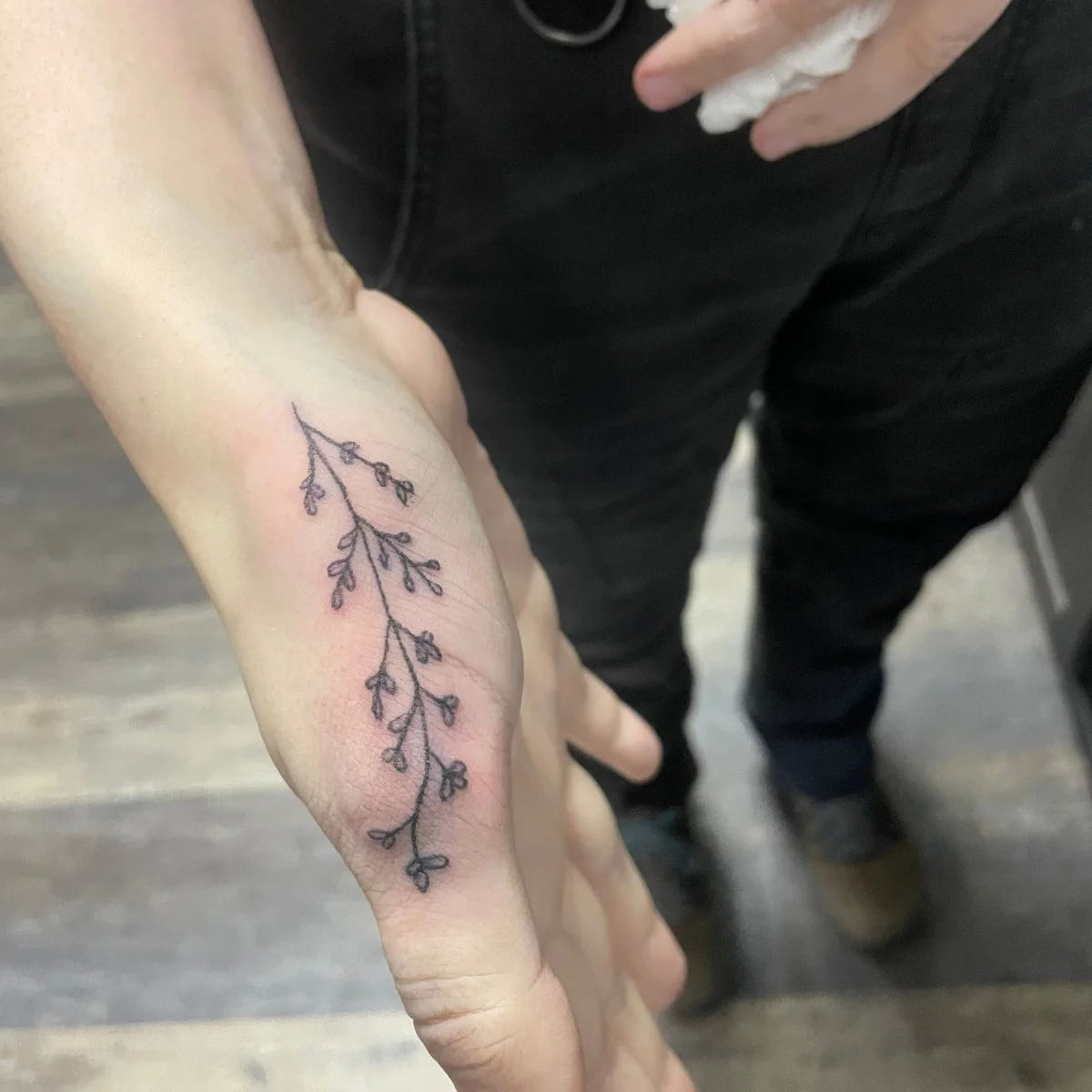 hand flower tattoo.jpg