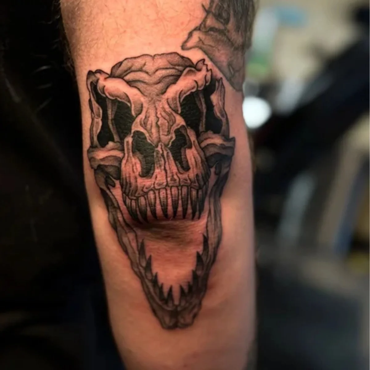 dinosaur skull realism tattoo.jpg
