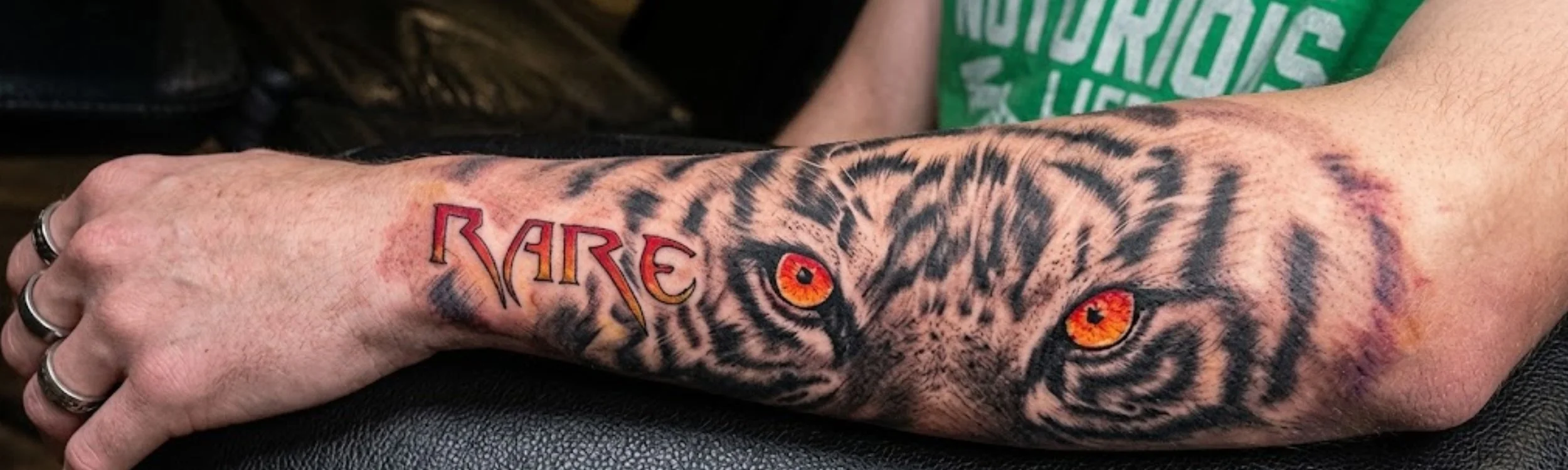 Tiger tattoo in forearms