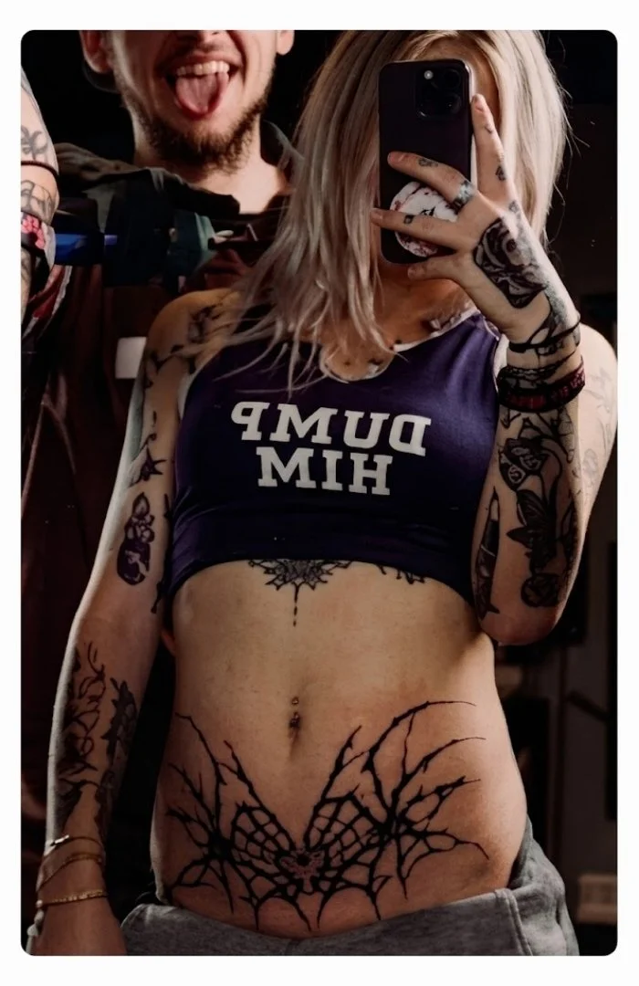 woman with cybersigilism tattoo