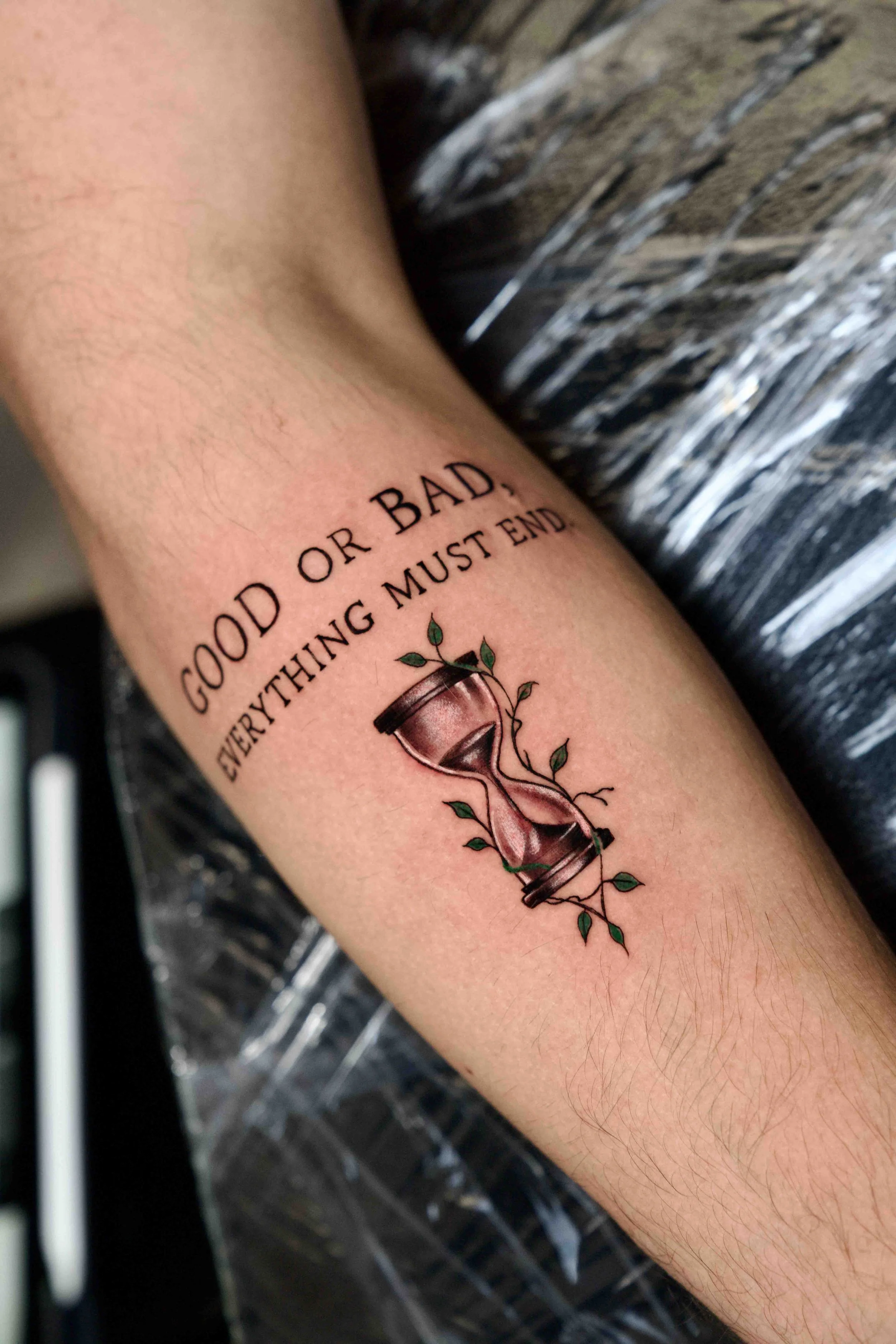 Forearm tattoo with handwritten script reading "GOOD OR BAD".