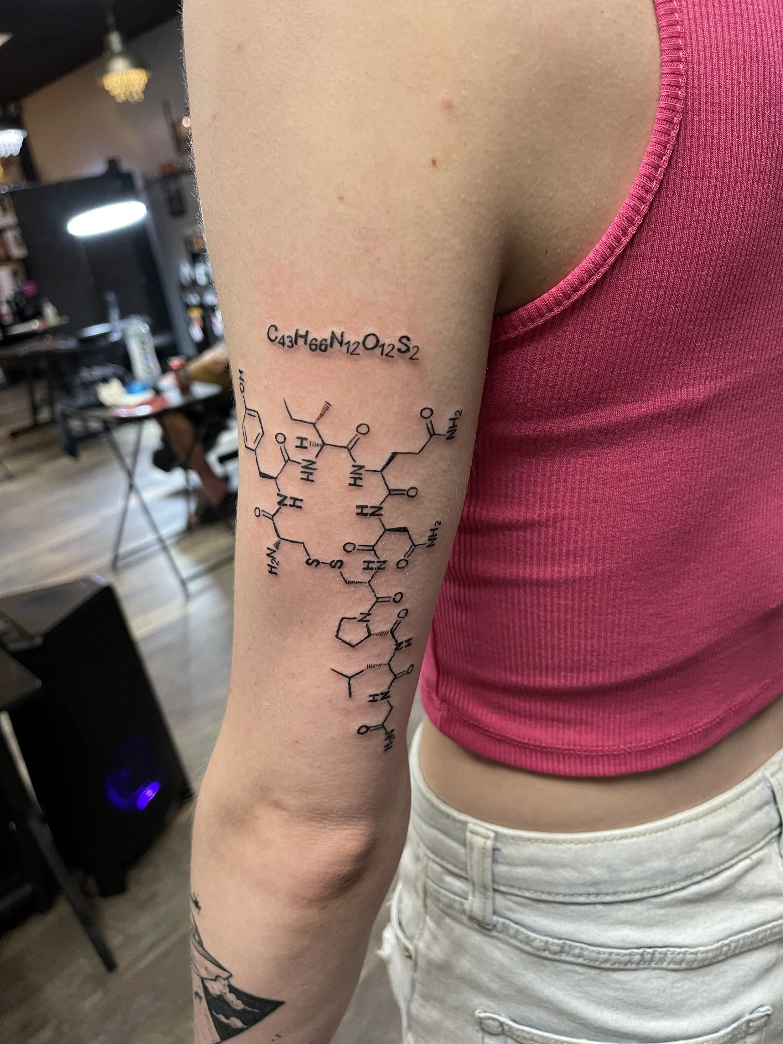 chemical fine line tattoo