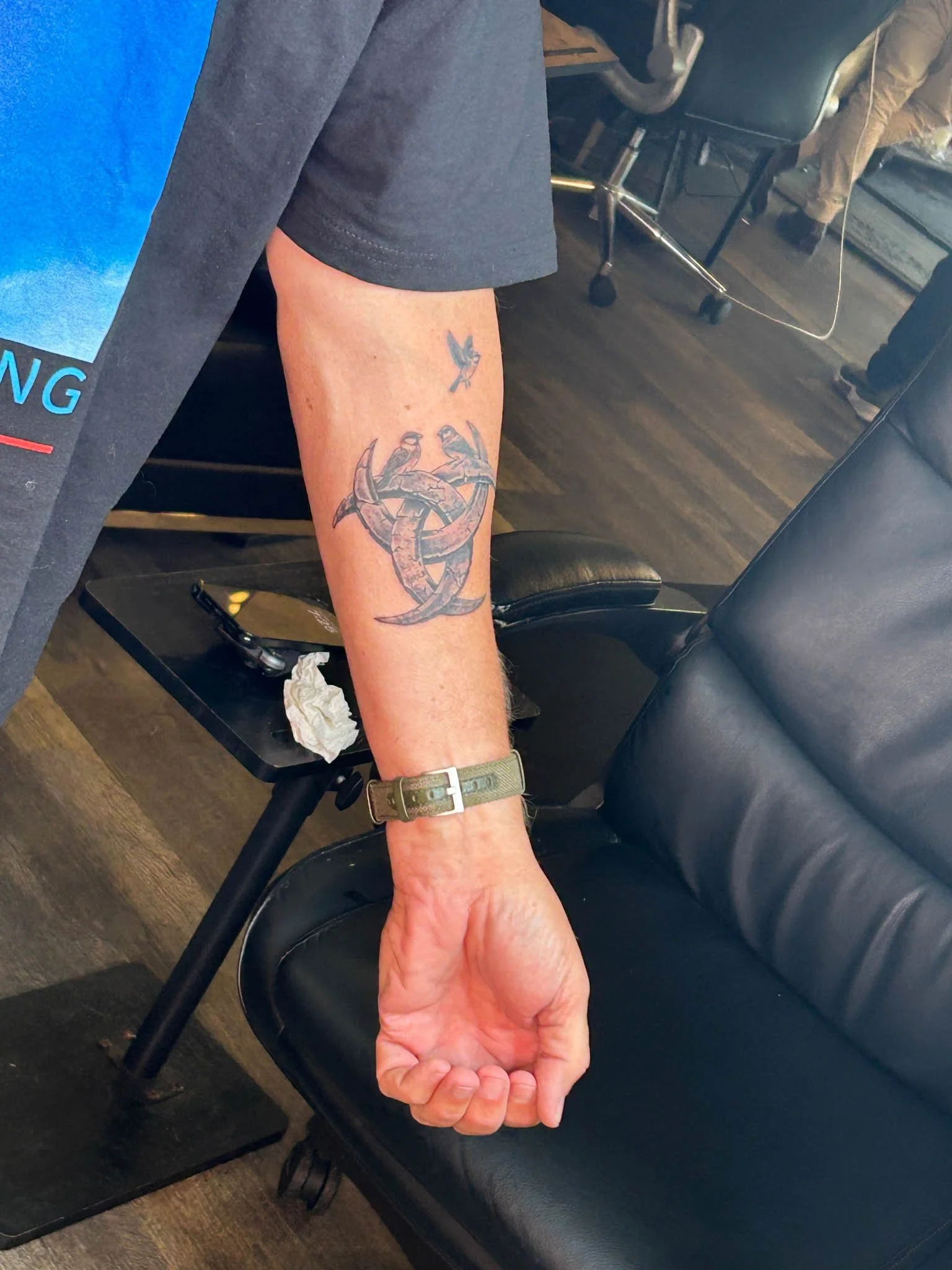 Close-up of a forearm tattoo.