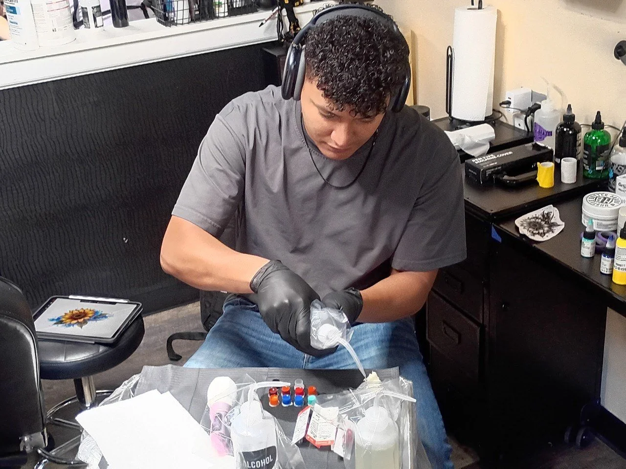 portrait of bht tattoo artist preparing inks
