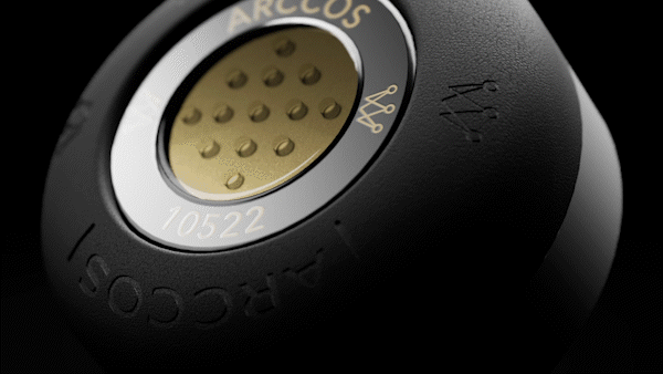 Close-up of an audio connector labeled 'ARCO' with a numbered serial and gold pins.