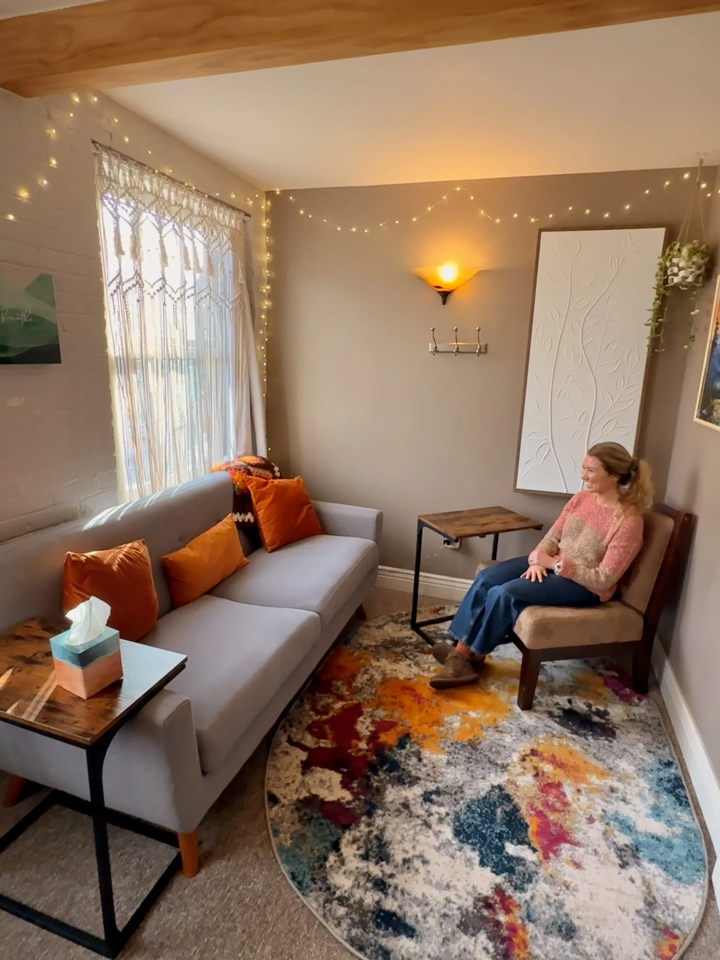 Warm, welcoming counseling office at Solrik Counseling. Hannah Covey, CMHC, therapist at Solrik Counseling in her Millcreek, Utah counseling office specializing in anxiety, trauma, EMDR, and relationship counseling