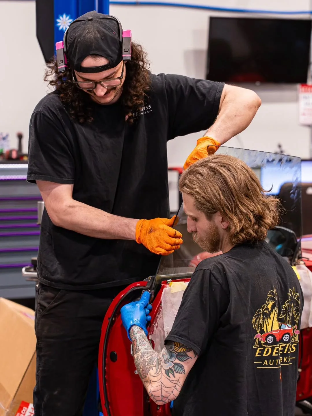 New glass for a old car! Shop foreman Matt installs a new driver's window glass in a low-mileage 1987 Mercedes 560SL convertible, as technician Silas assists.

Is your classic in need of a little love this spring? Appointments are filling up fast - r