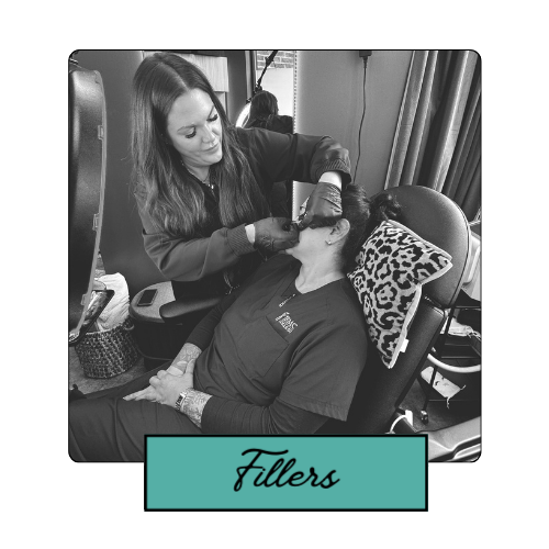 Close-up of a syringe near a person's lips labeled "Fillers." The Injection Room Medspa in Loveland, CO