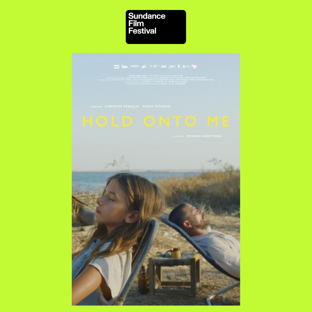 Poster for the Sundance Film Festival featuring a scene from the film 'Hold Onto Me,' showing a woman and man lounging outdoors near the water at sunset.