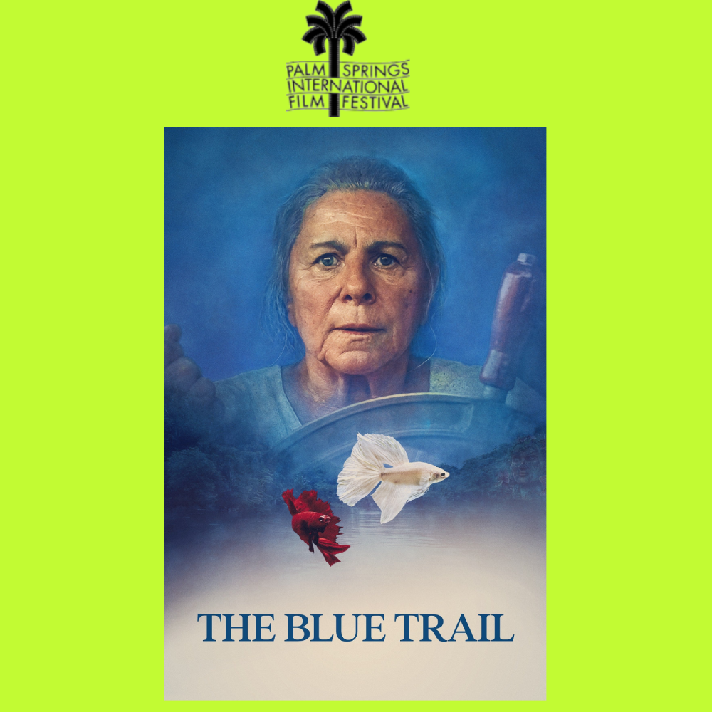 Poster for the film 'The Blue Trail' featuring an older woman with gray hair and a serious expression, flying fish, and a vibrant blue background. The Palm Springs International Film Festival logo is at the top.