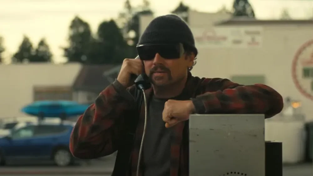 Leonardo DiCaprio using a payphone