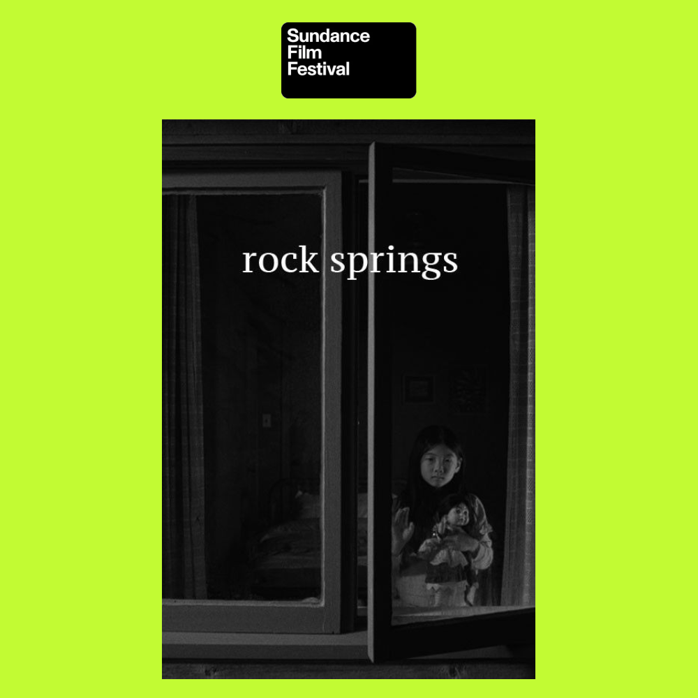 A young girl looking out of an open window, holding a doll, taken at the Sundance Film Festival, with a lime green background and black text.