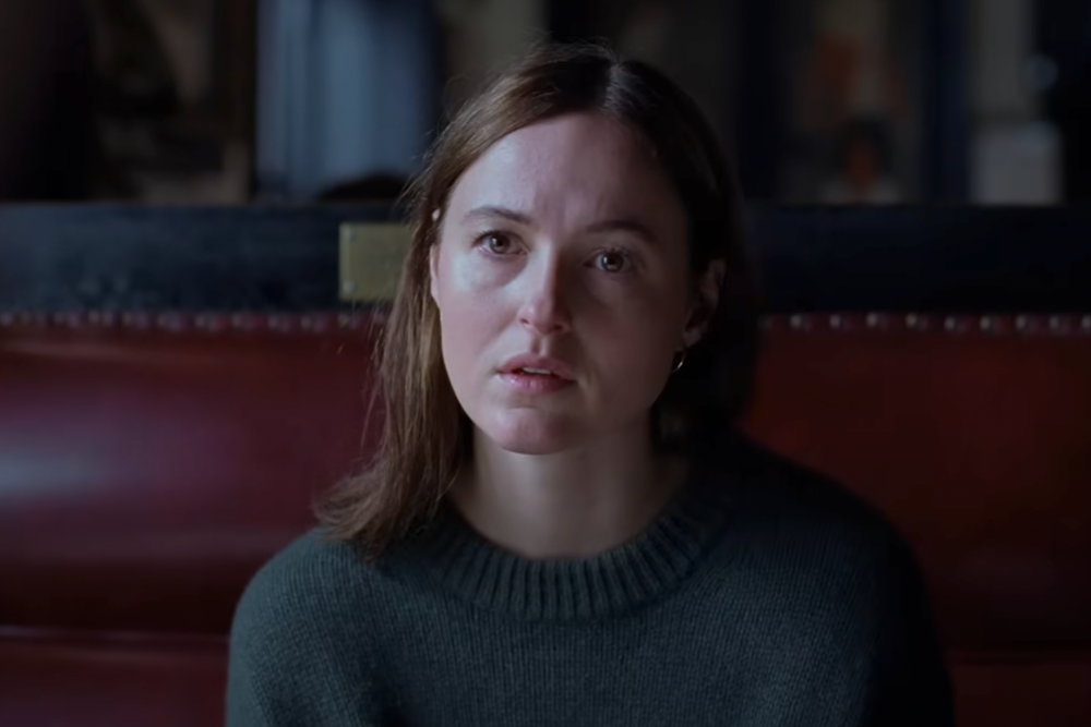 Renate Reinsve with a concerned look on her face in the film Sentimental Value