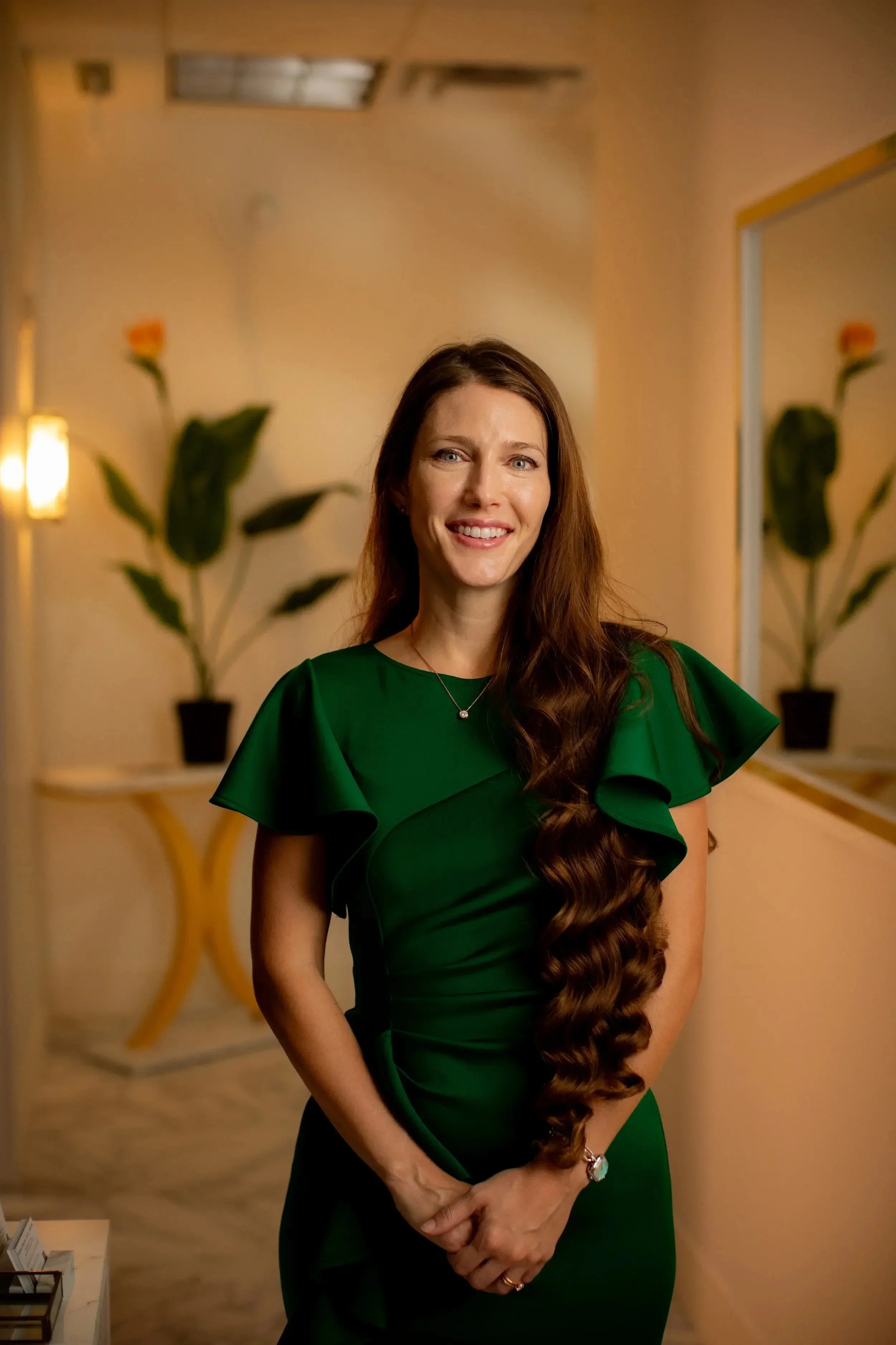 Concierge women's health and preventive care physician Dr. Victoria Herold smiling in the Clover Family Medicine office